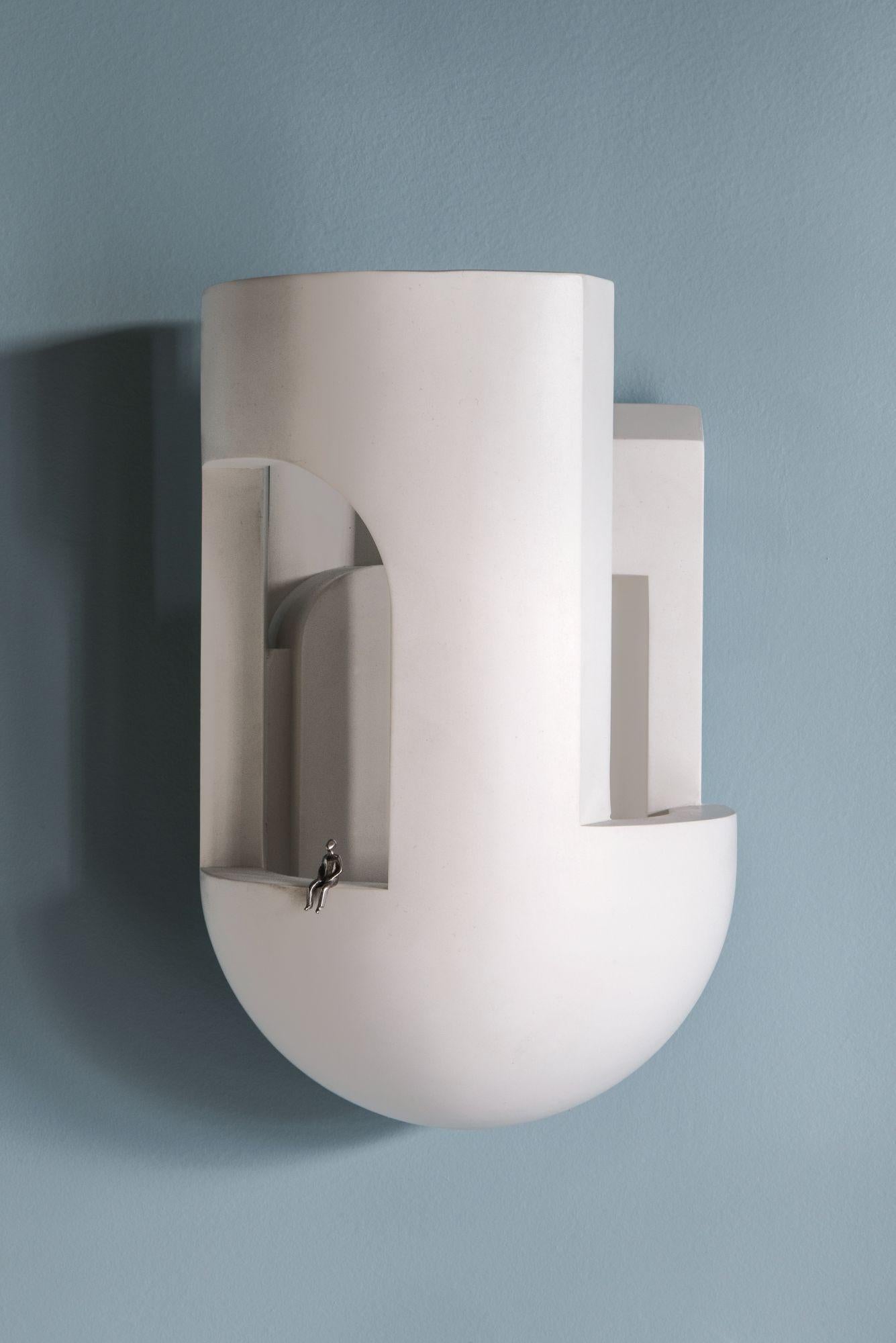 DCW Editions Soul Story 3 Wall Lamp in White Plaster by Charles Kalpakian
 
 Plaster lamp intended as wall lamps and designed to be scrutinised as if entering a dark alley at dusk and suddenly being pierced with a surreal ray of light.
 A