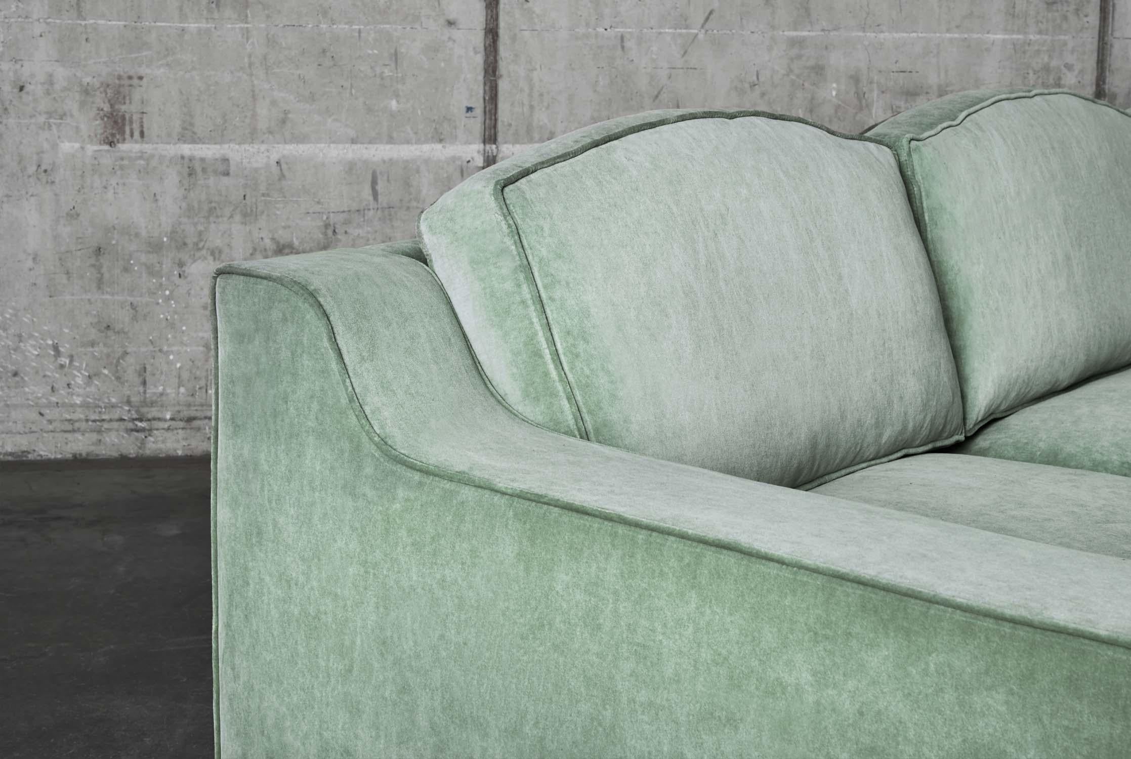 Lola, named after our daughter. The sofa consists of a frame in solid beech and plywood and has loose cushions with layers of different cold foam, polyether, fiber filling and down for a firm as well as comfortable sofa in one. DD Lola Sofa has an