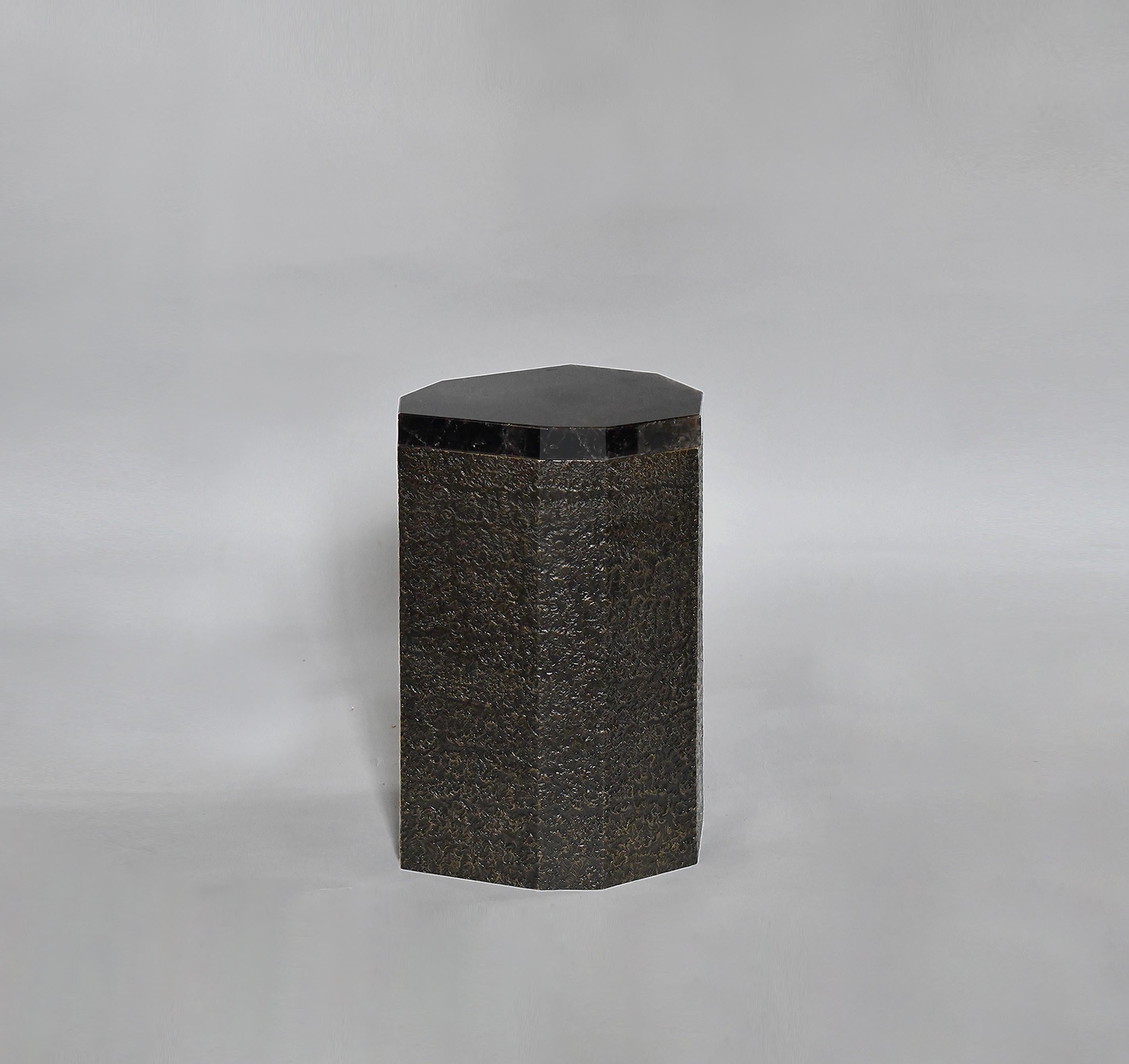 Elegant form rock crystal side table created by Phoenix Gallery, NYC. Hammered antique brass base with dark smoky rock crystal quartz top. 
Custom size and finish upon request.