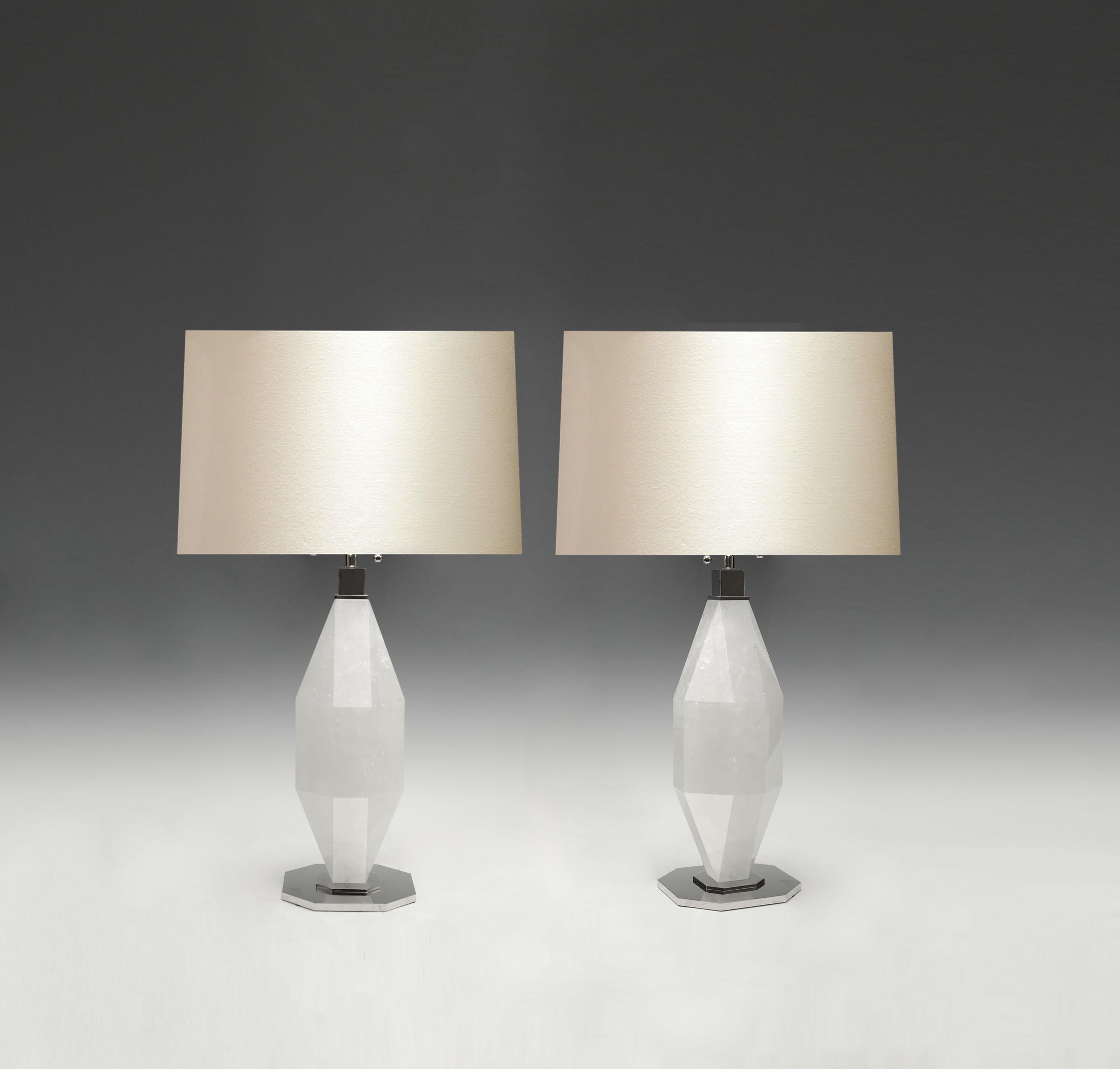 Pair of diamond rock crystal lamps with nickel plating bases. Created by Phoenix Gallery, NYC. 
Each lamp installs two sockets.
Lampshade do not include.
To the top of the rock crystal 18 in / H.