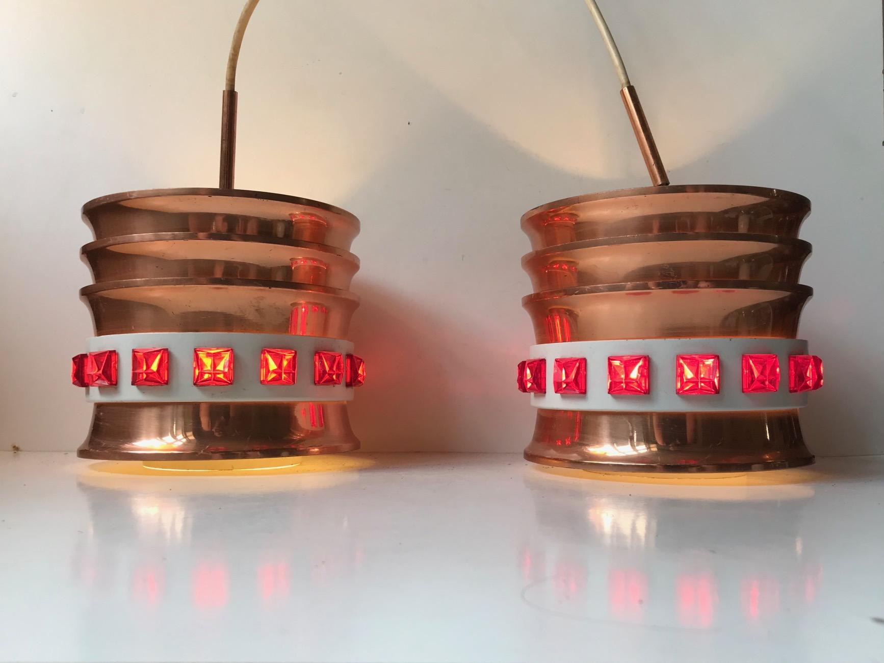 Here is the chance to acquire a pair of ceiling lamps made in a country no longer in existence. The former DDR - Eastern Germany. These lights were made by VEB Metalldrücke in Halle during the early 1970s. They are made from solid copper set with