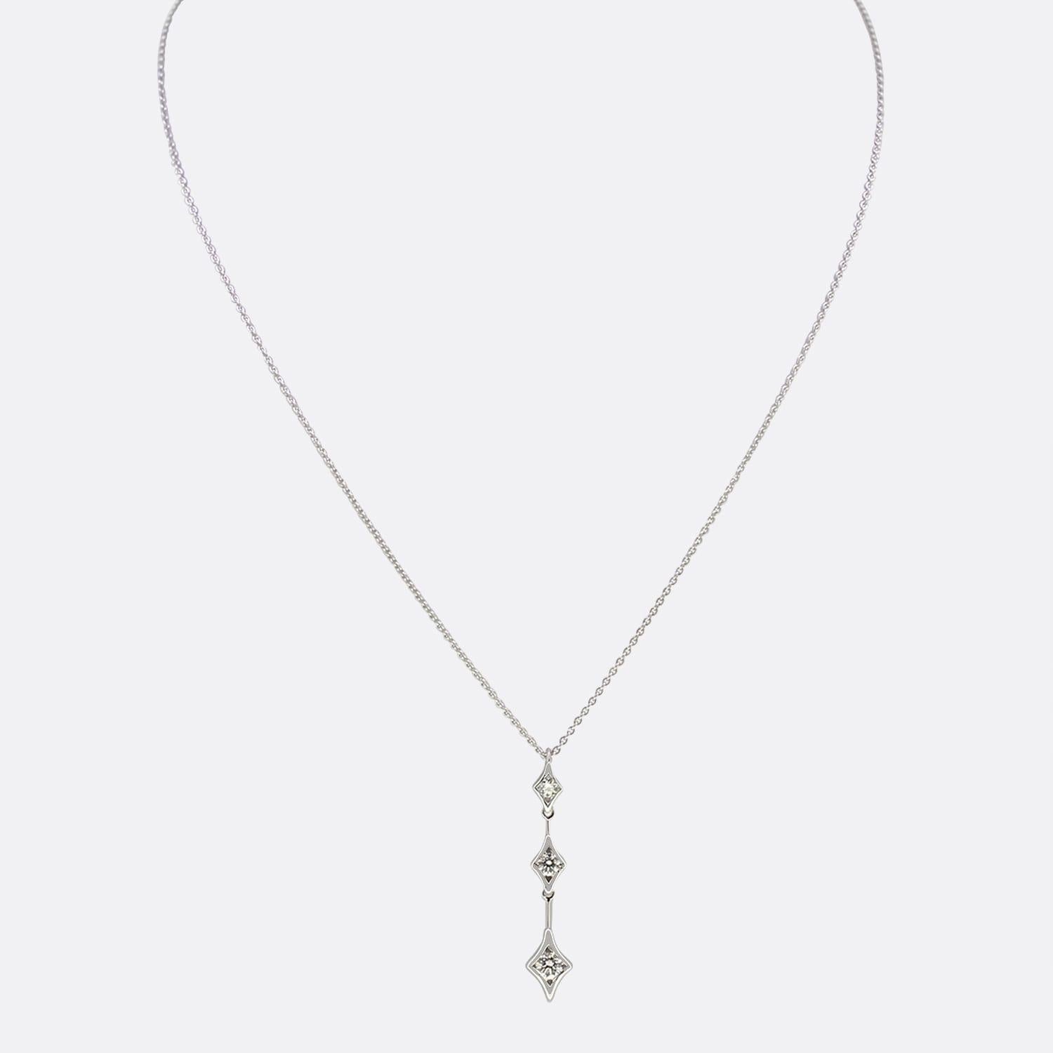 This is an 18ct white gold diamond pendant necklace from the designer De Beers. The distinguished necklace plays host to 3 brilliant round cut diamonds that progressively get larger. This simple yet elegant design creates a classy look.

Condition:
