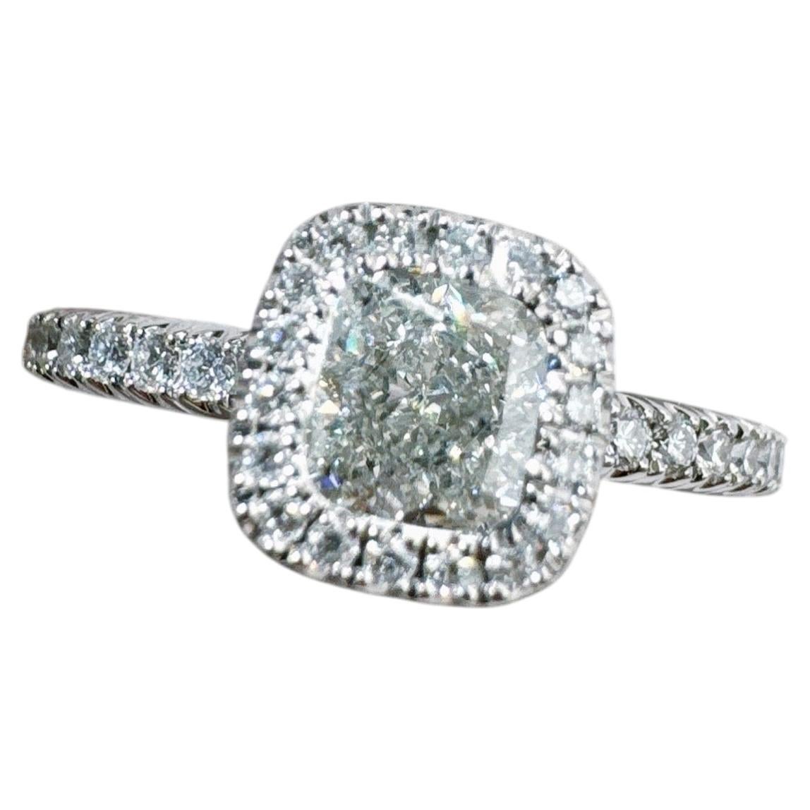 De Beers 1 Carat Cushion-Cut Platinum Diamond Ring with Luxurious Halo Setting