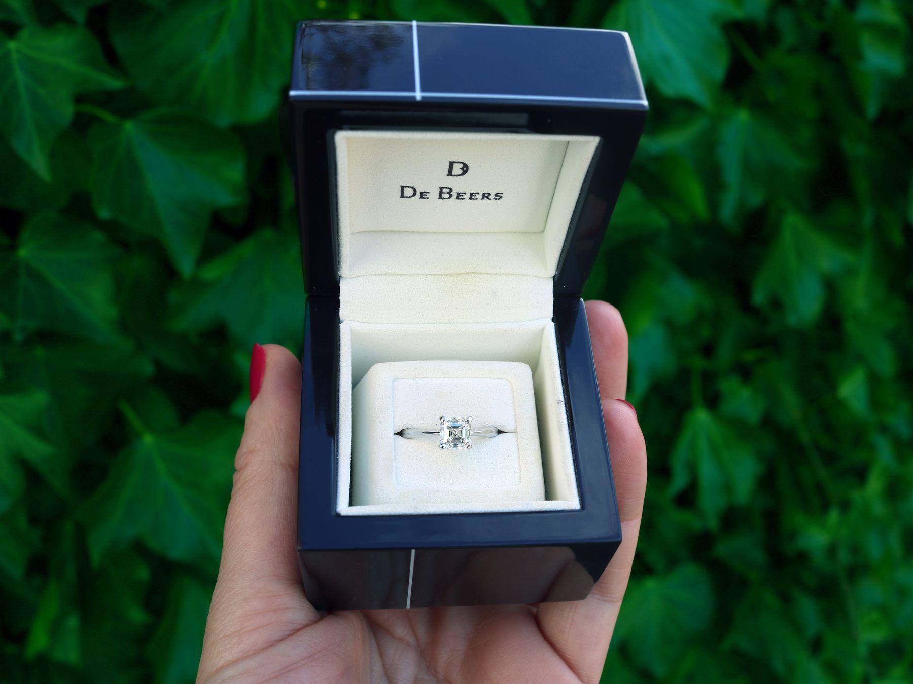 An impressive contemporary 1.20 carat De Beers diamond and platinum solitaire engagement ring; part of our diverse diamond jewelry and estate jewelry collections.

This fine and impressive diamond engagement ring has been crafted in platinum.

The