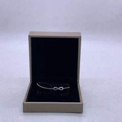 Bracelet « Infinity Diamond » de De Beers, chaîne pavée en or blanc 18 carats