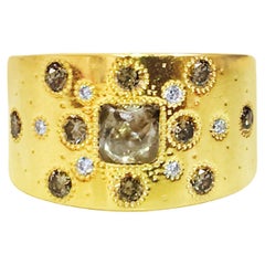 Bague De Beers, or jaune 18 carats et diamant brut