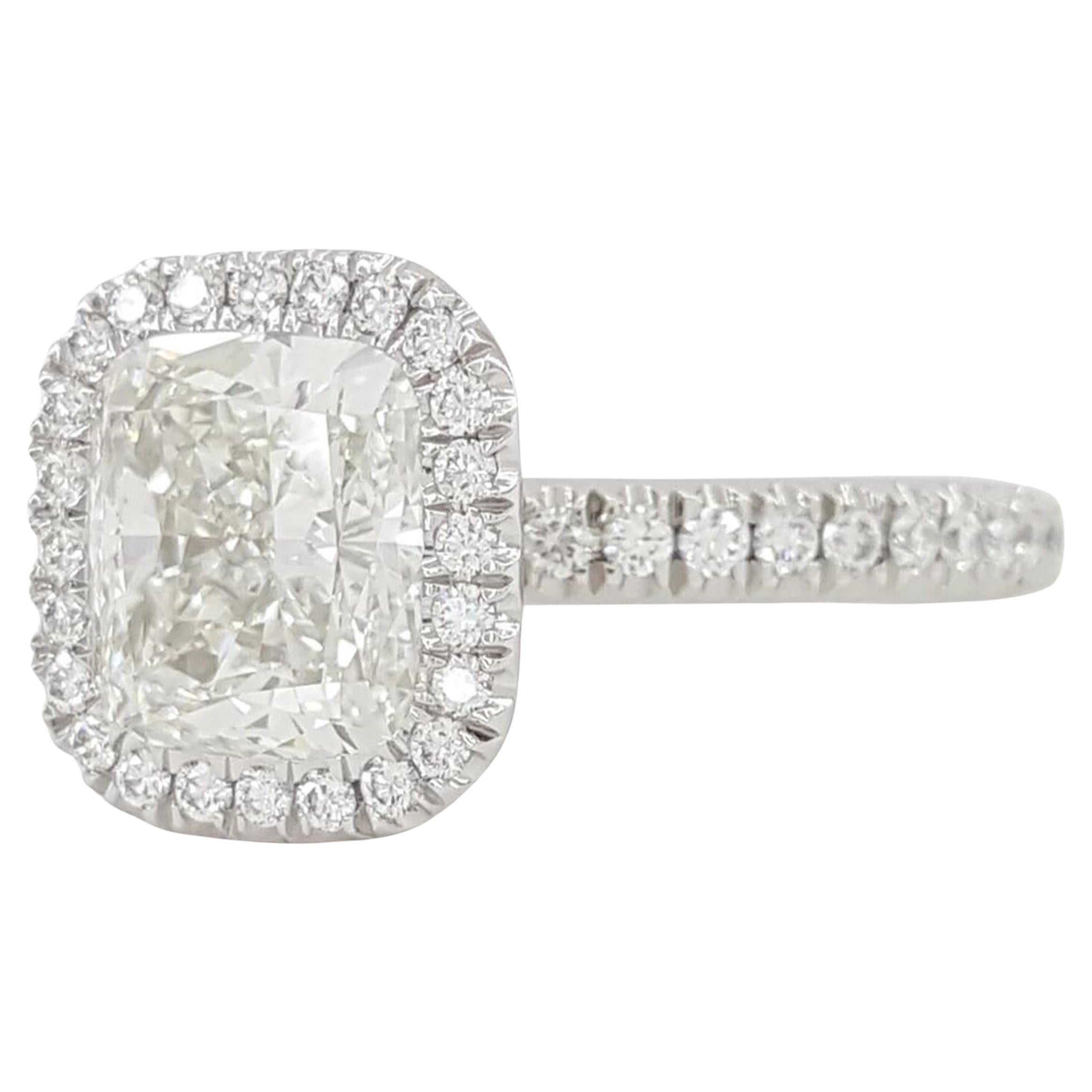 De Beers 2.54 ct Aura Elongated Cushion Brilliant Cut Diamond Halo Platinum Engagement Ring.

The ring weighs 6 grams, size 4.75,  the center stone is a Natural Aura Elongated Cushion 2.01 ct Brilliant Cut diamond, H in color, VS2 in clarity, Ideal
