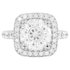 De Beers Verlobungsring aus Platin mit 3,52 Karat rundem Diamant-Halo im Brillantschliff