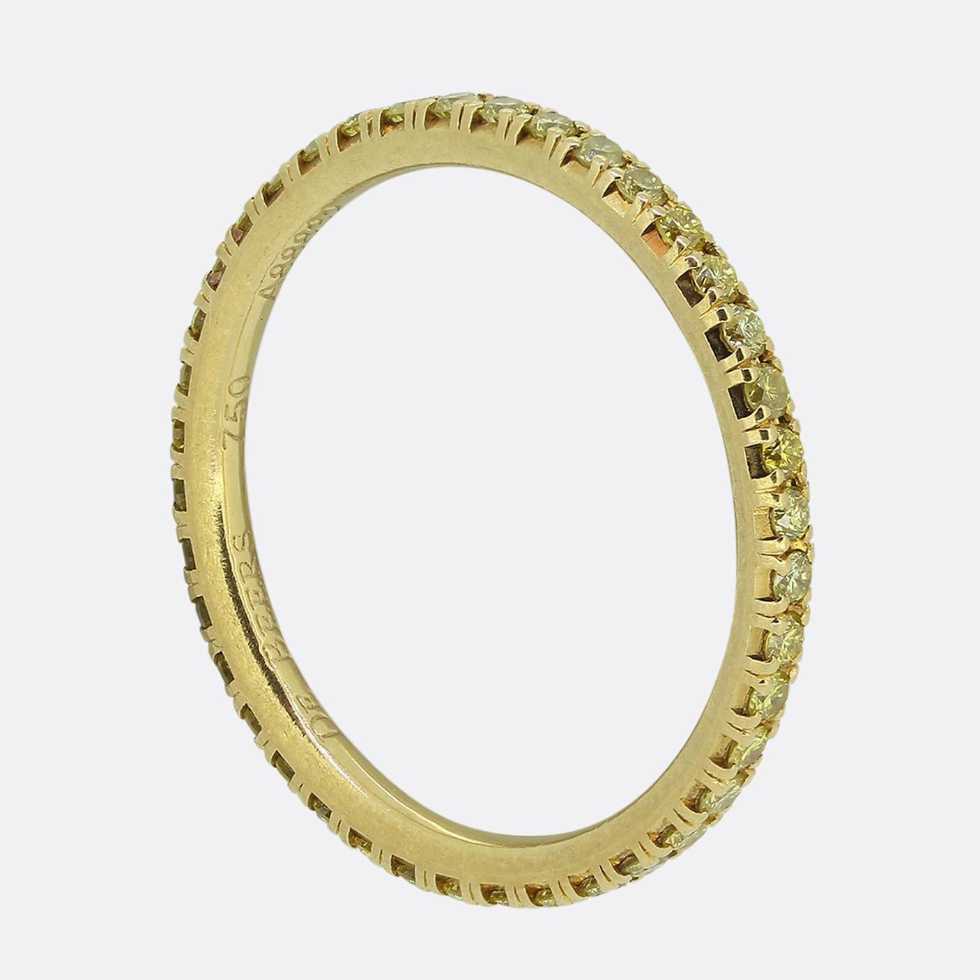 Here we have a beautiful and timeless diamond eternity ring from the De Beers group. Yellow is universally considered to symbolise radiance and joy. In this diamond ring, a captivating collection of vivid yellow round brilliant micropavé diamonds