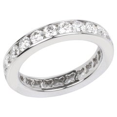 Anillo de eternidad De Beers con diamante talla brillante en platino