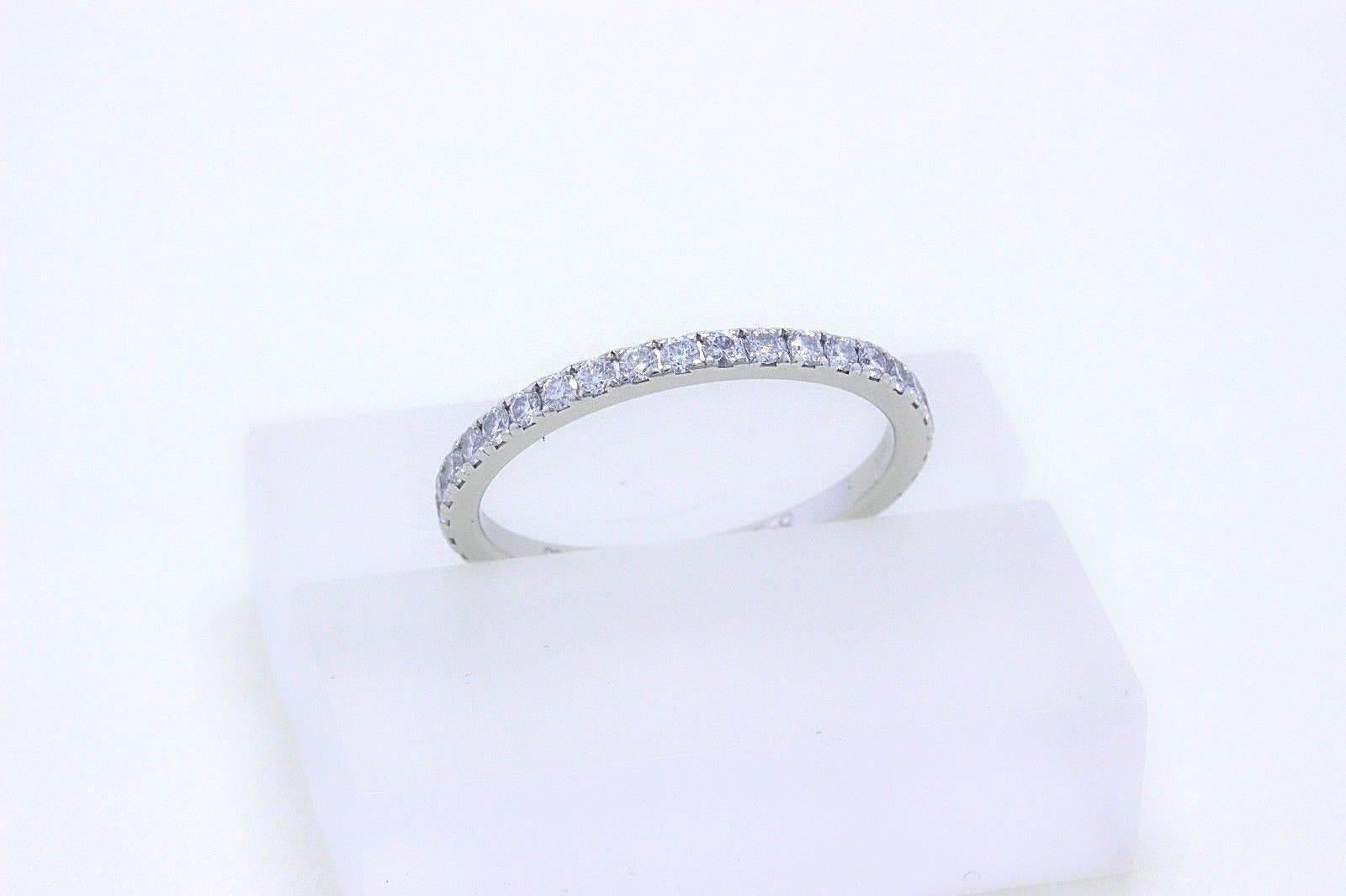 Anello a fascia con diamante classico De Beers 0,60 TCW in platino con carte In condizioni ottime in vendita a San Diego, CA