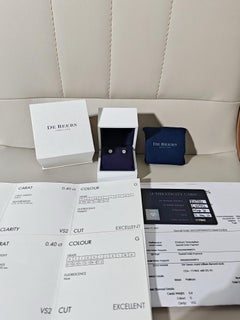 De Beers DB Classic PT950 Platin-Diamantohrstecker mit vier Krappen