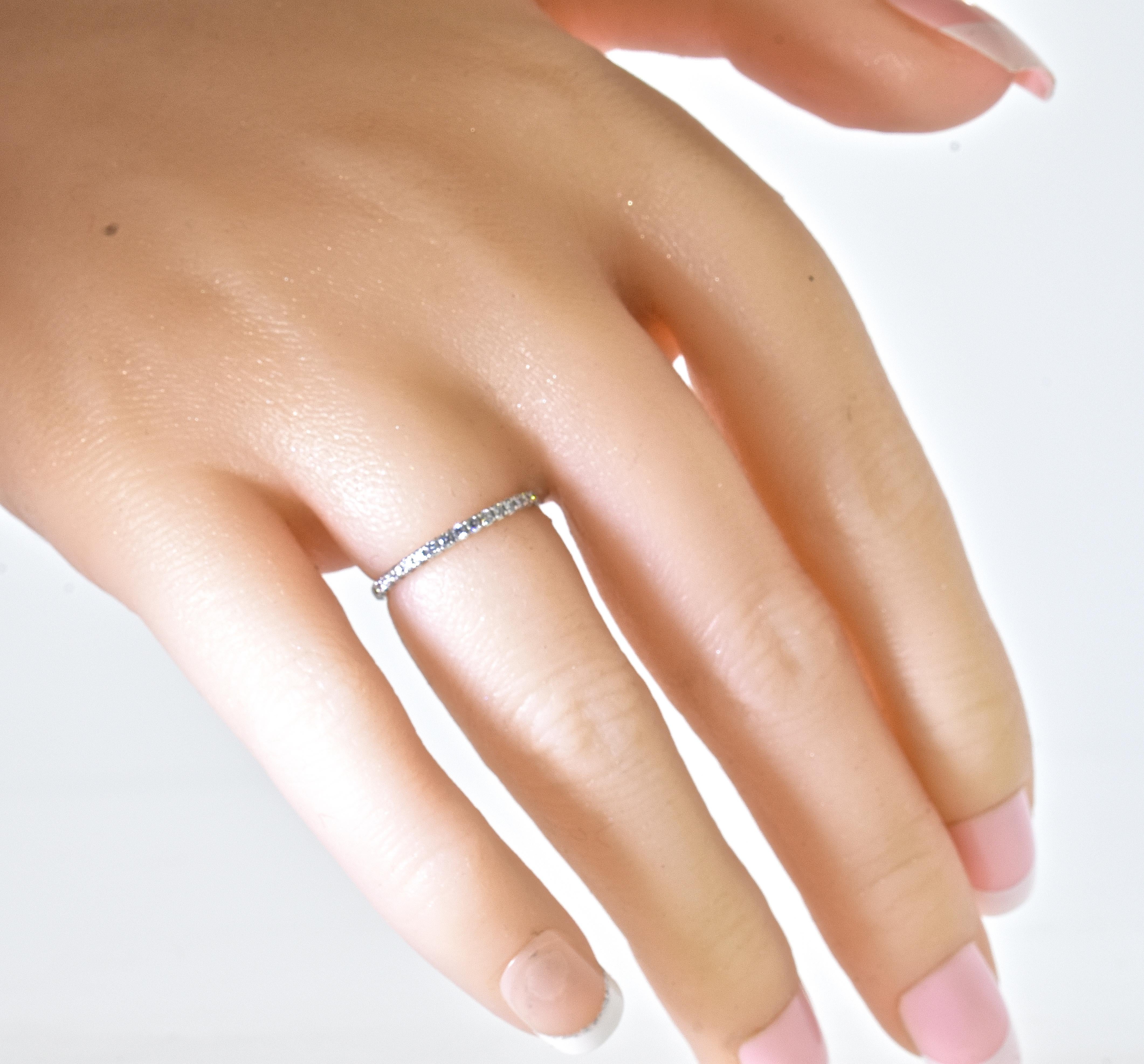 Brilliant Cut De Beers Diamond Eternity Band in 18K White Gold For Sale