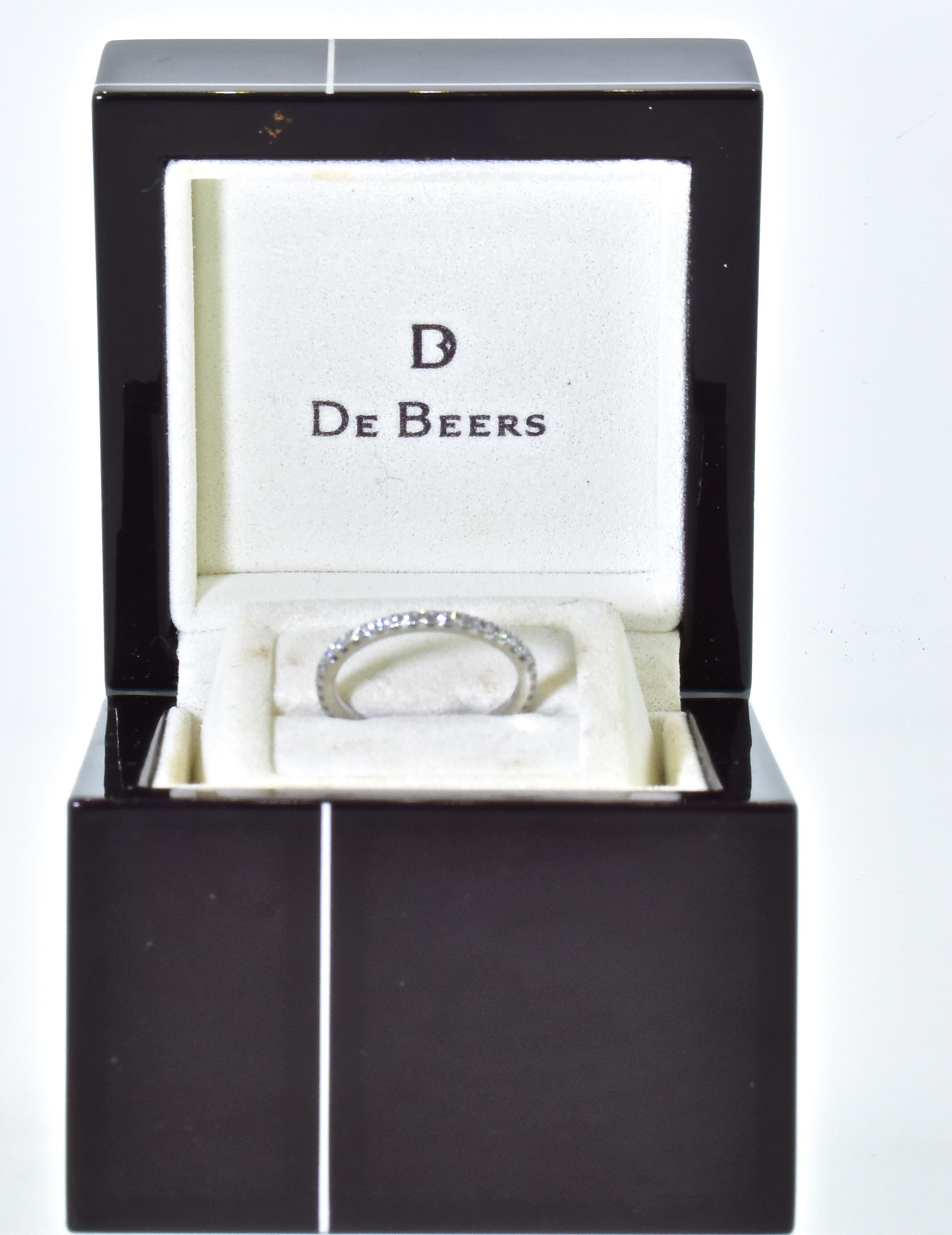 Brilliant Cut De Beers Diamond Eternity Band in 18K White Gold For Sale