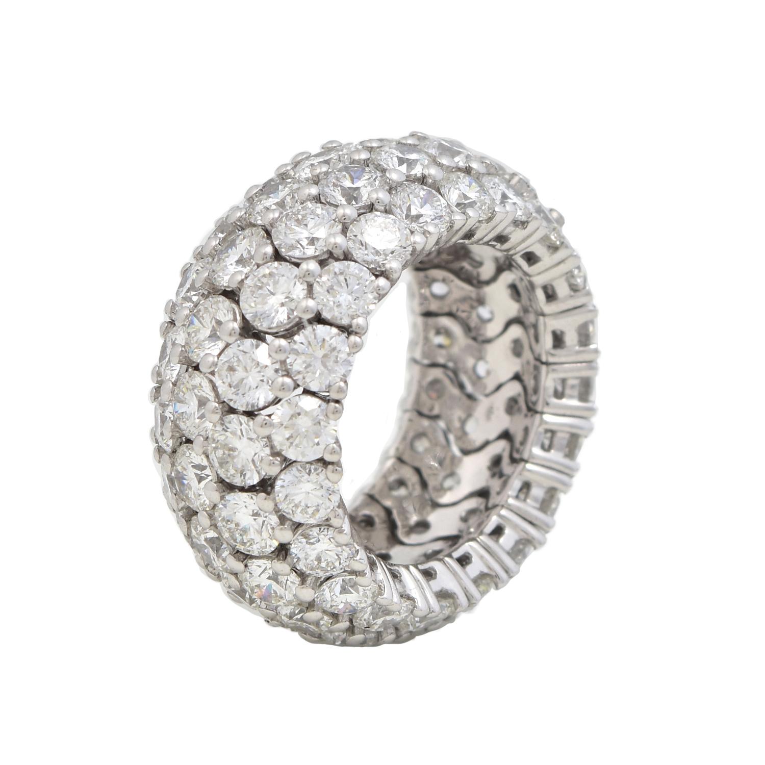 Designer: De Beers

Style: Cocktail Ring

Metal: White Gold

Metal Purity: 18k

Stones:  76 Round Brilliant Cut Diamonds

Diamond Color: D    

Diamond Clarity: VVS

Total Carat Weight:  approx. 15.0

Total Item Weight (grams): 15.3

Band Thickness: