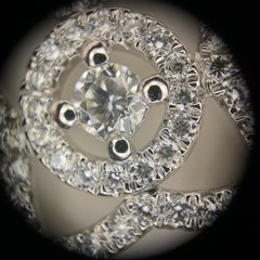 De Beers Enchanted Lotus Medal Pendant 18K white gold pavé diamonds.