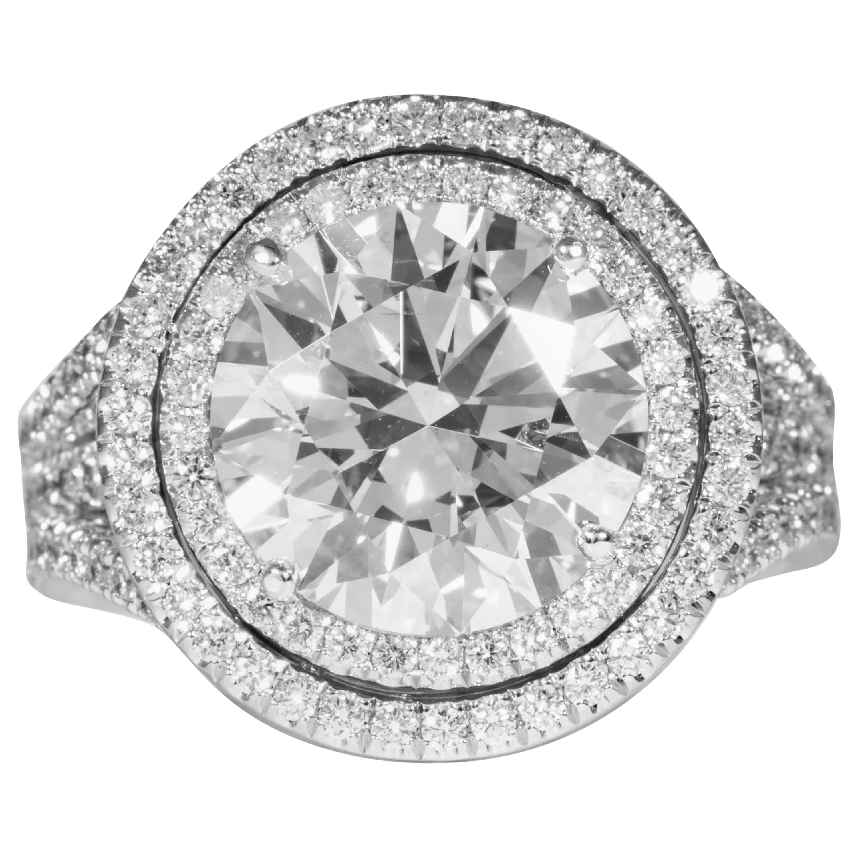 De Beers GIA Certified 5.01 Carat H SI1 Round Brilliant Cut Diamond & Plat. Ring