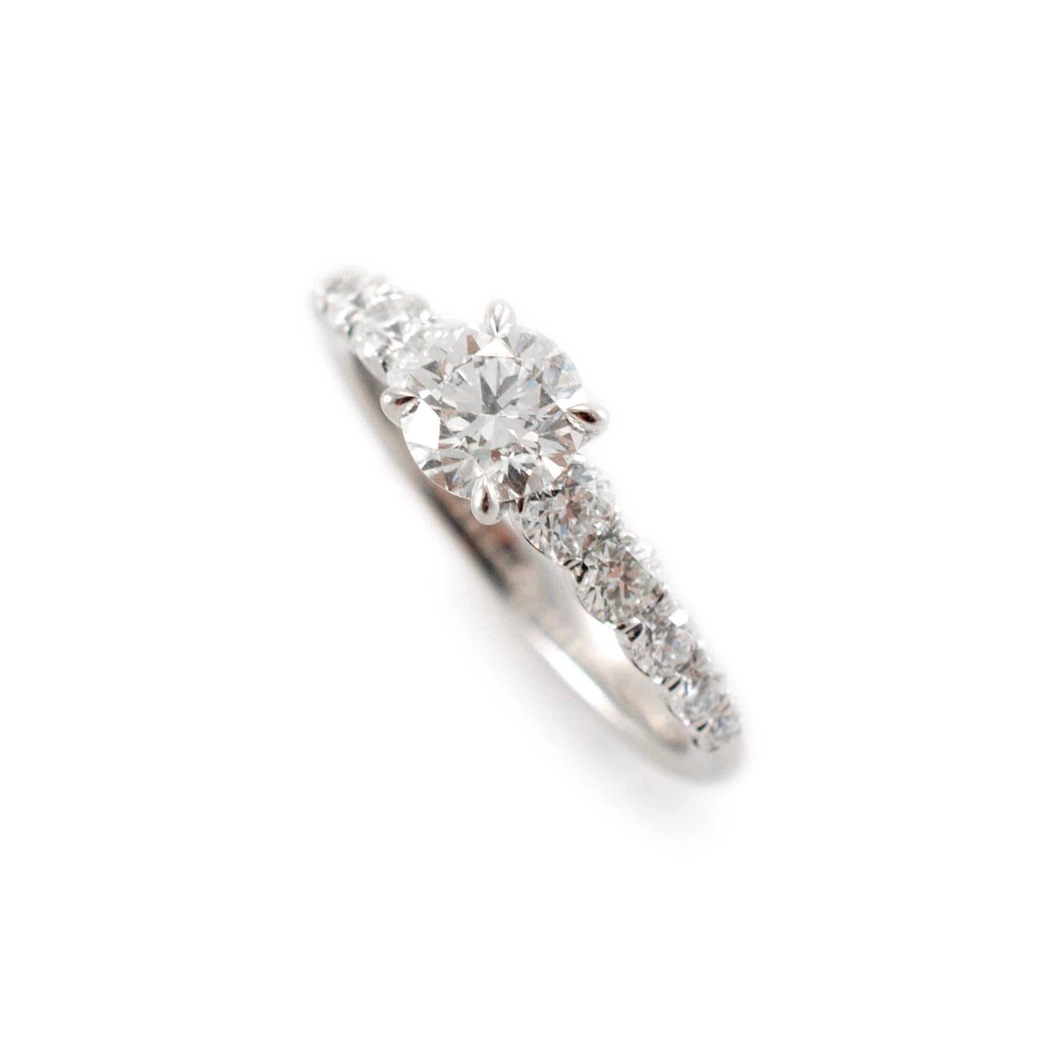 Brand: De Beers

Gender: Ladies

Ring Size: 6.5

Metal Type: 950 Platinum

Weight:  4.86 grams

Ladies 950 Platinum diamond engagement accented ring with a half-round shank. The metal was tested and determined to be 950 platinum. Engraved with