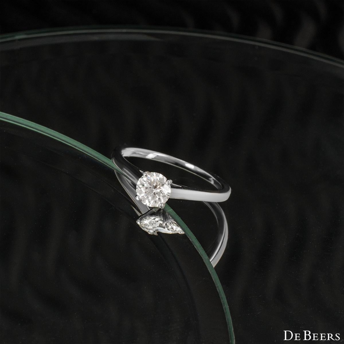 Round Cut De Beers Platinum Diamond Engagement Ring 0.52 Carat H/VS1 For Sale