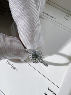 Anillo Halo de De Beers con diamante brillante redondo de platino
