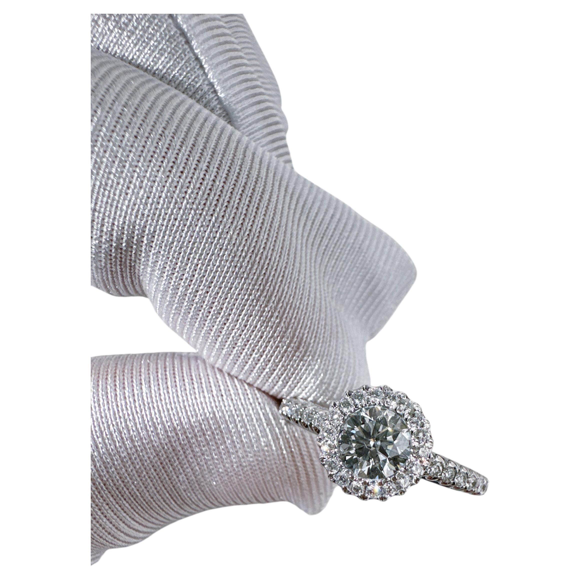 De Beers Platinum Round Brilliant Diamond Halo Ring For Sale