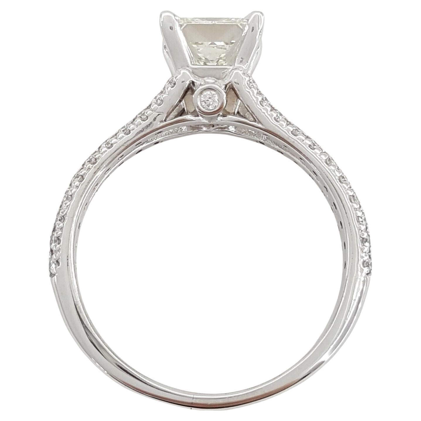 Modern DE BEERS Princess Brilliant Cut Diamond Halo Platinum Engagement Ring For Sale