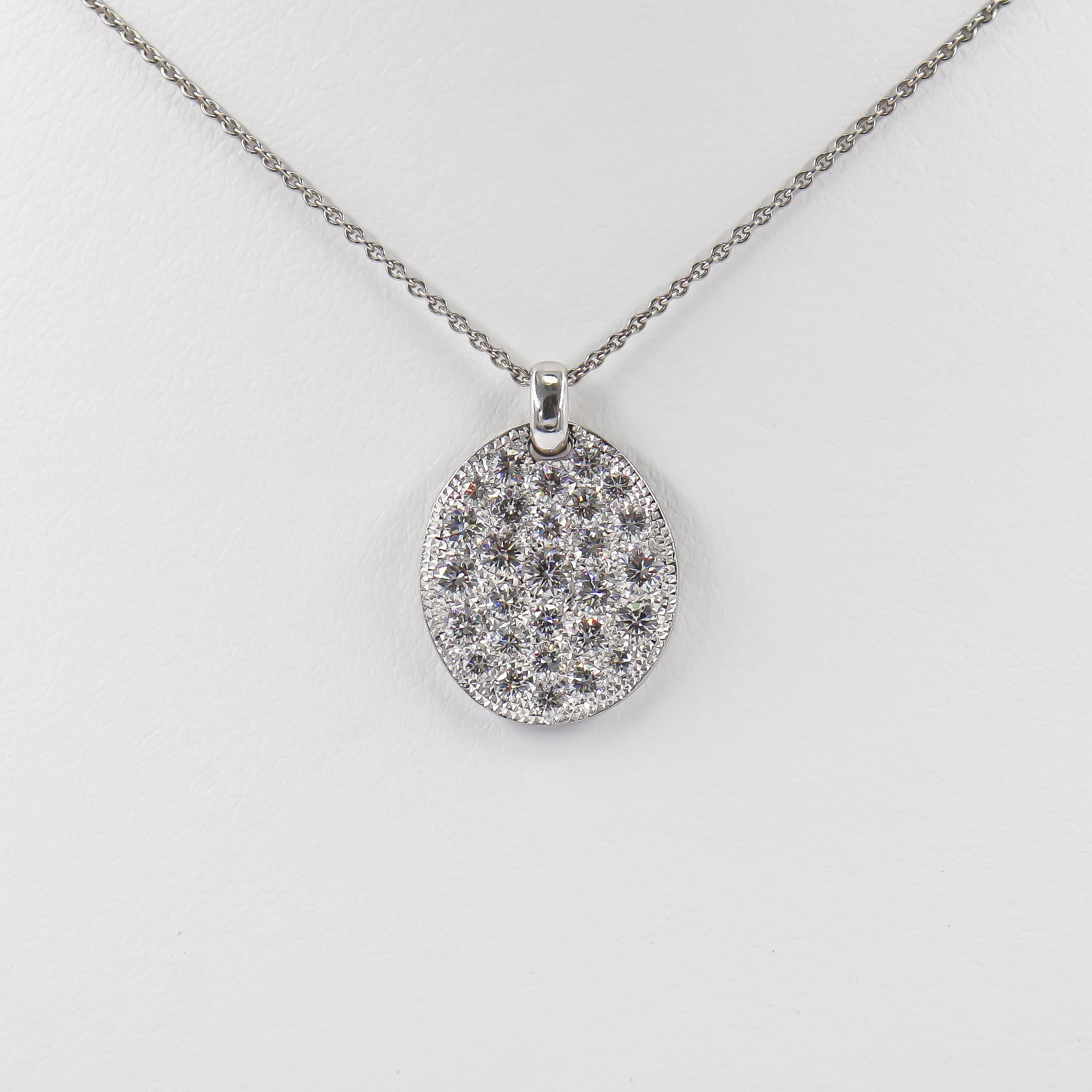 This incredible acquisition by the house of J. Birnbach features a signed De Beers pendant necklace from the esteemed Talisman collection. Set with 29 round brilliant cut diamonds of G color and VS+ clarity = 1.38 carat total weight, this design is
