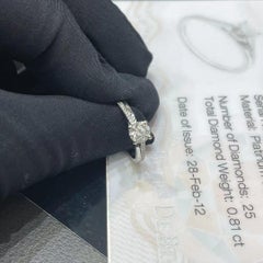 De Beers La Promesa Anillo de Diamantes Solitario 0,7ct VS1 Color G Talla 48