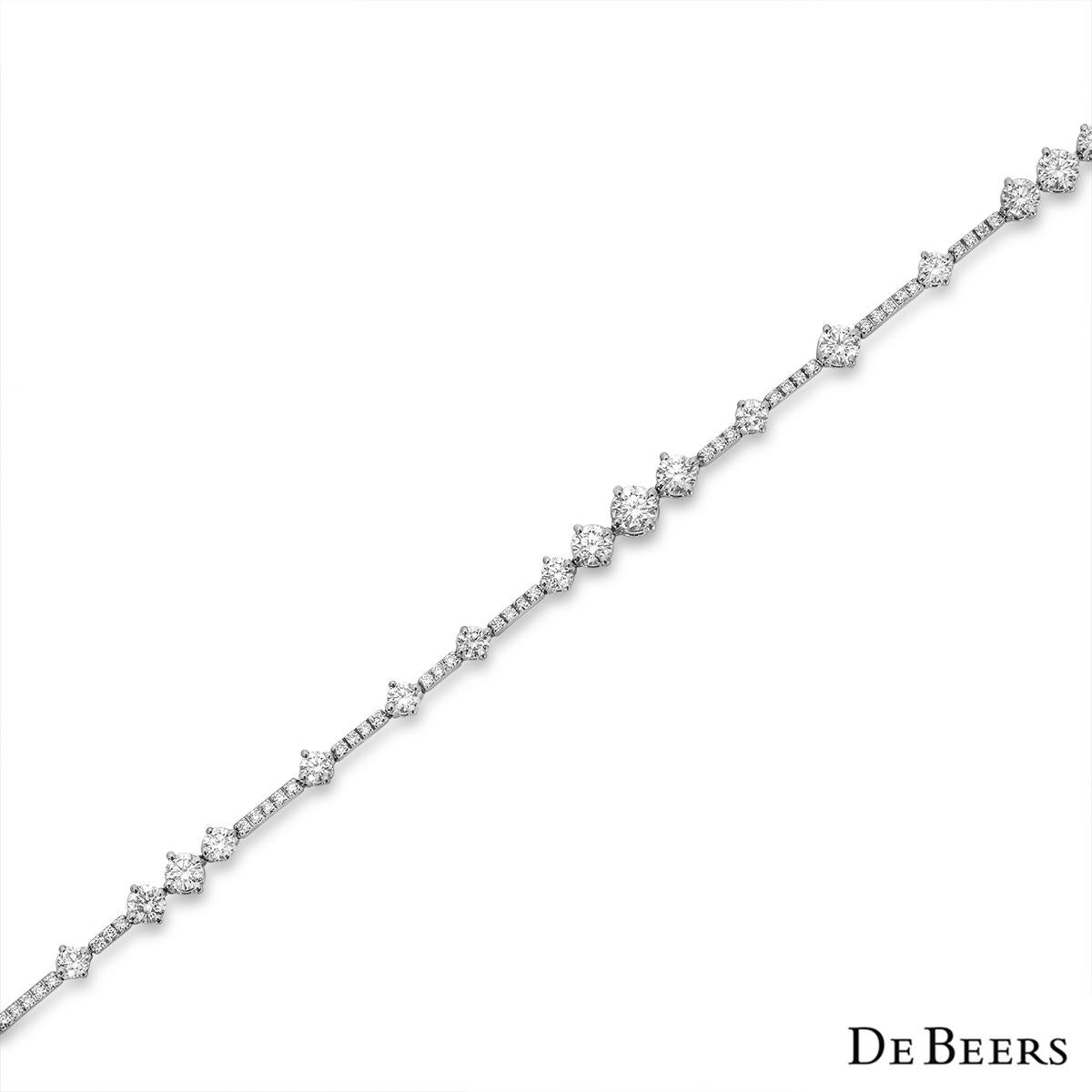 An exceptional 18k white gold diamond bracelet by De Beers from the Apreggia collection. The tennis bracelet is set with 91 round brilliant cut diamonds, varying in size, with a total carat weight of 2.62ct, G+ colour and VS+ clarity. The line