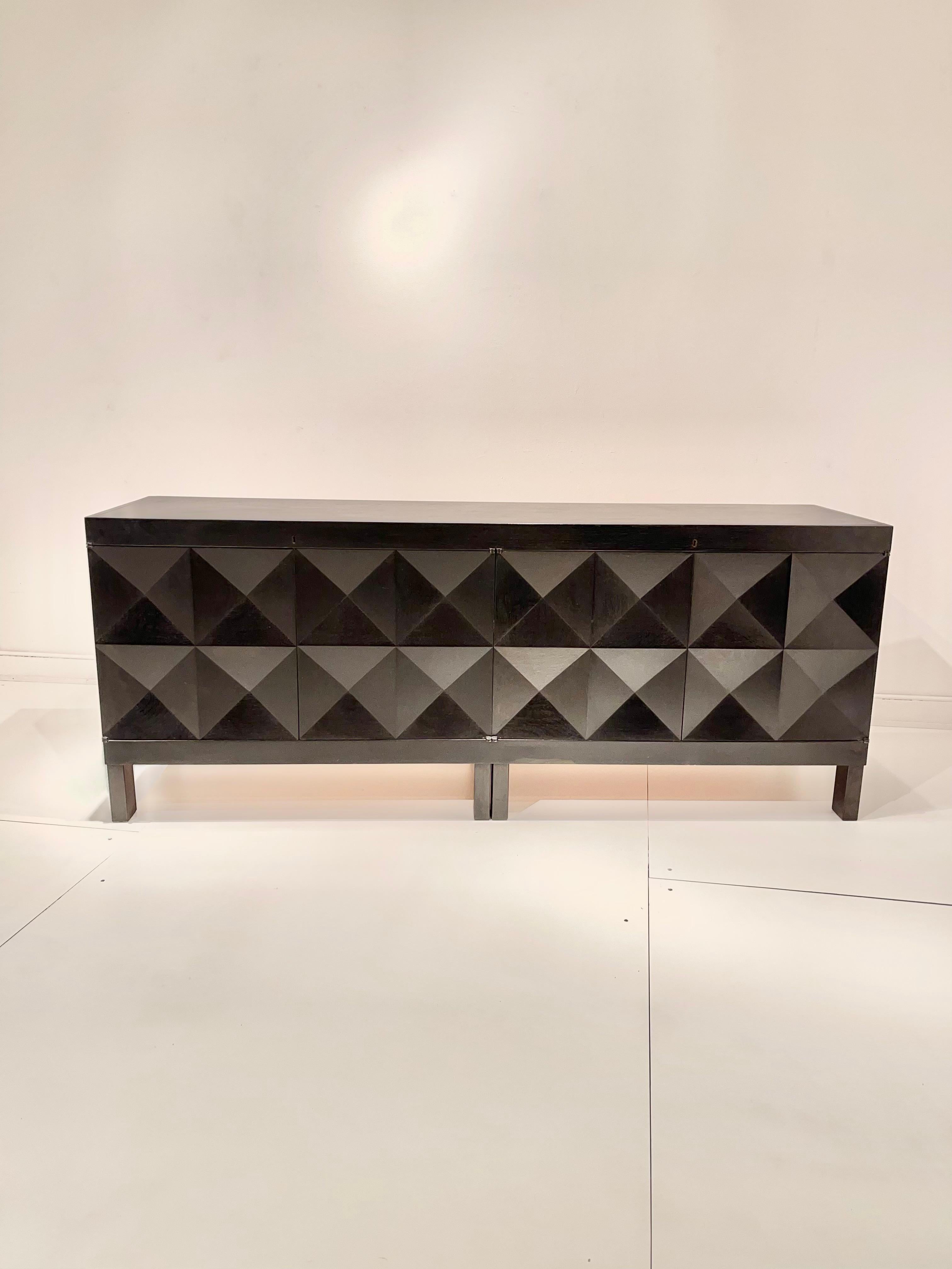 De Coene black oak painted cabinet in 2 parts , made in Belgium in the 1970s. Brutalist sideboards . More famous are his similar designs with a diamond pattern or a wavy pattern. Included key and in excellent original condition. with