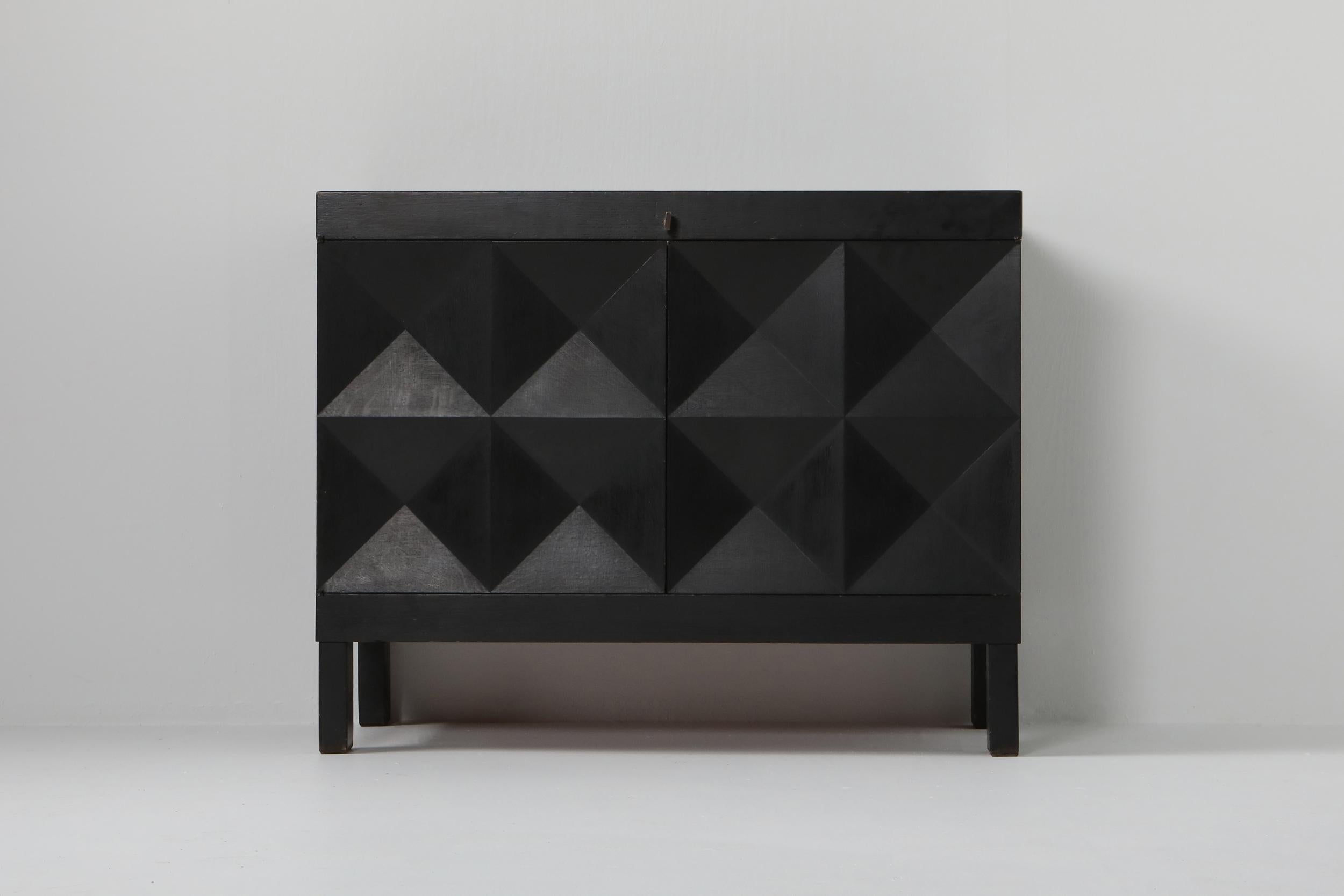 Geometrical dry bar, De Coene Belgium, ebonized oak, 1970s



De Coene was founded in 1887 in Kortrijk (Belgium) by Jozef de Coene, who was at that time 13 years old. In 1895 his younger brother Adolphe joined the company. In their early years
