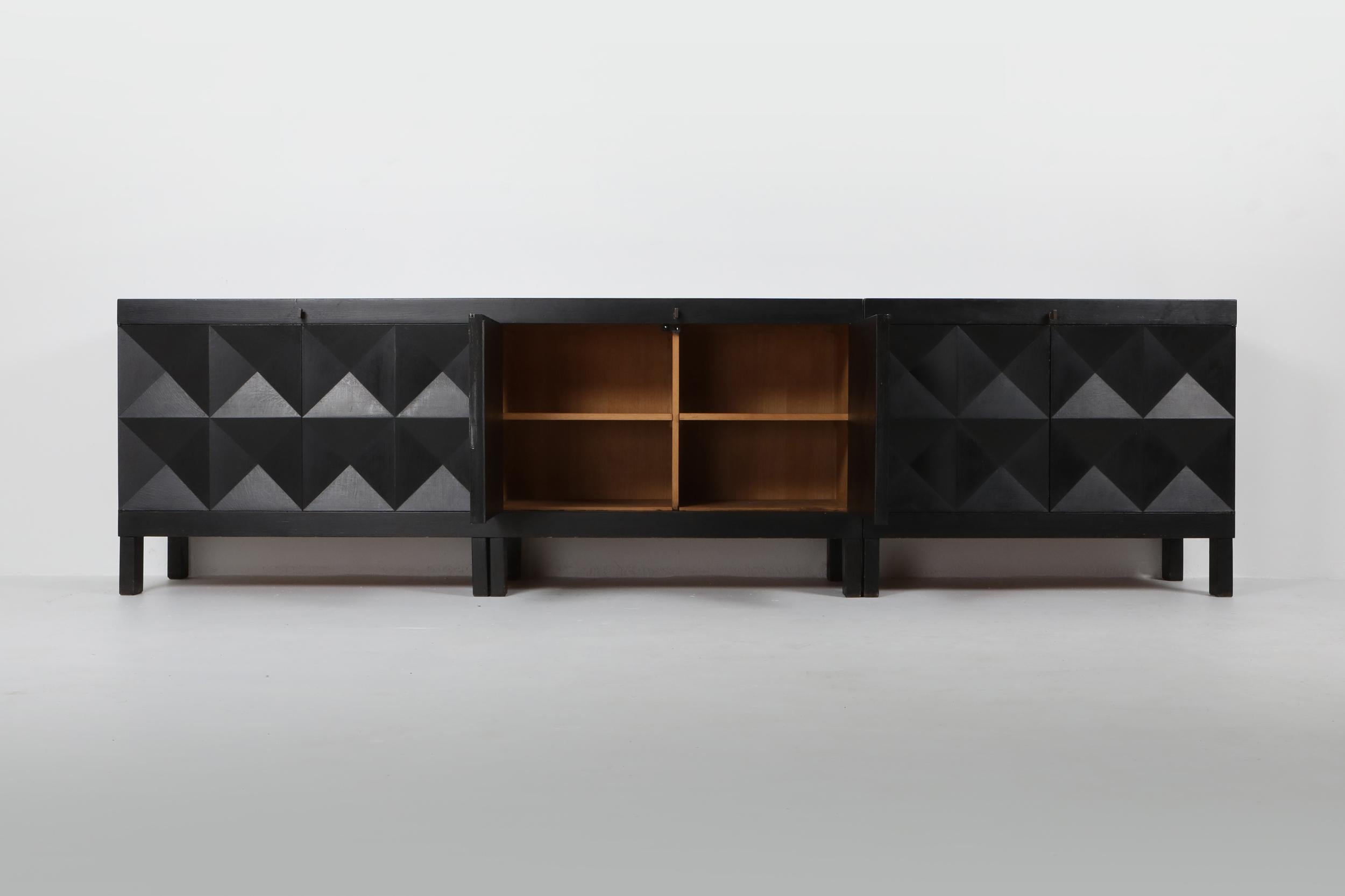 Geometrical credenza, De Coene Belgium, ebonized oak, 1970s
This is an extra large sideboard which actually consists of a regular size sideboard and cabinet placed next to each other giving a total width of 3 meters.
Both piece are also available
