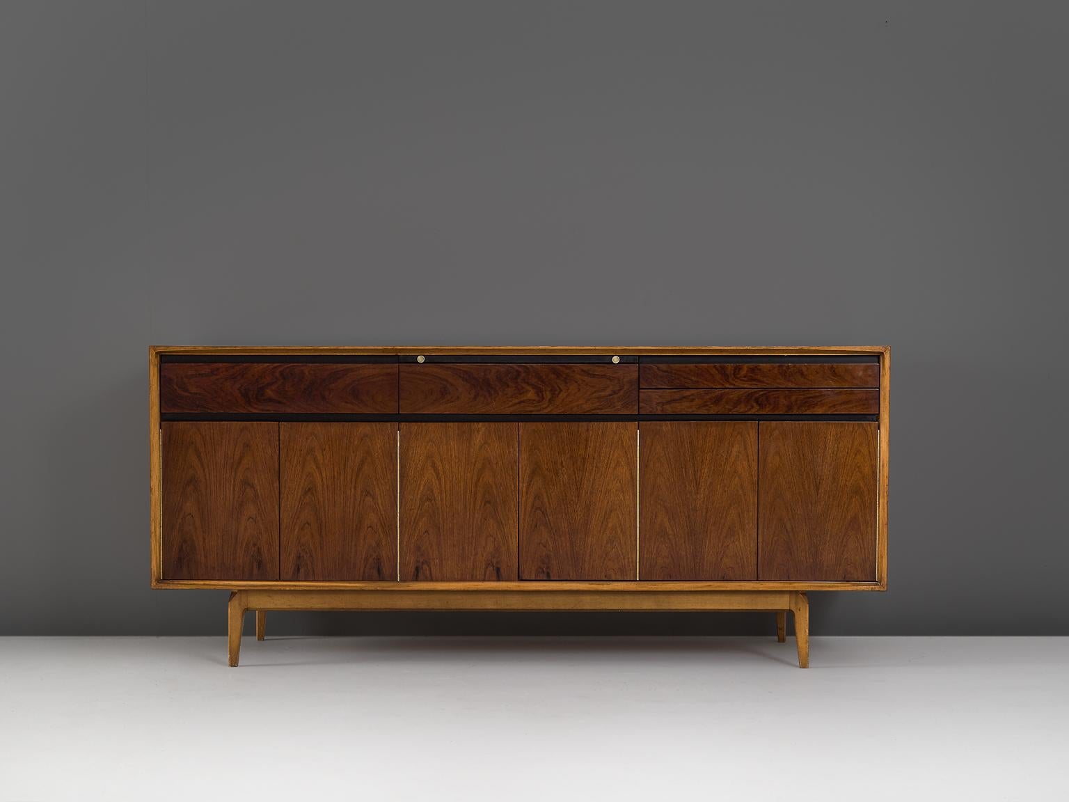 Credenza, in walnut and rosewood, for De Coene, Belgium, 1950s. 

Highly rare credenza by 'De Coene Freres' Belgium, 1958. This sideboard is produced in rosewood and walnut which is striking. The piece show well-designed lines and interesting