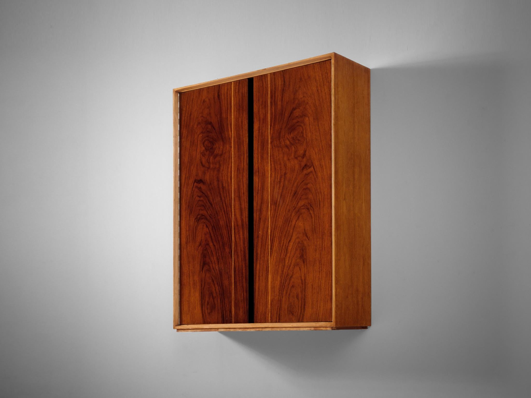 De Coene Frères, bar cabinet model 'Madison', walnut, Belgium, 1958.

Floating wall-mounted dry bar in walnut by de Belgian manufacturer De Coene. The quality of pieces from these manufacturers are absolutely stunning and hold great details. The