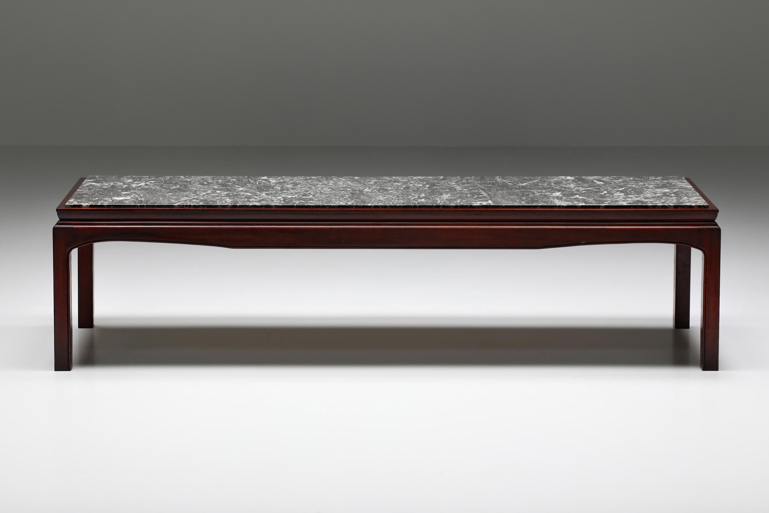 De Coene; Belgian design; Craftsmanship; Marble; Mahogany; Coffee table; Japanoiserie style; Mid-Century Modern, 1950's

De Coene mahogany and marble coffee table created in Belgium in circa 1950. The rich materials and Japanoiserie and Art Deco