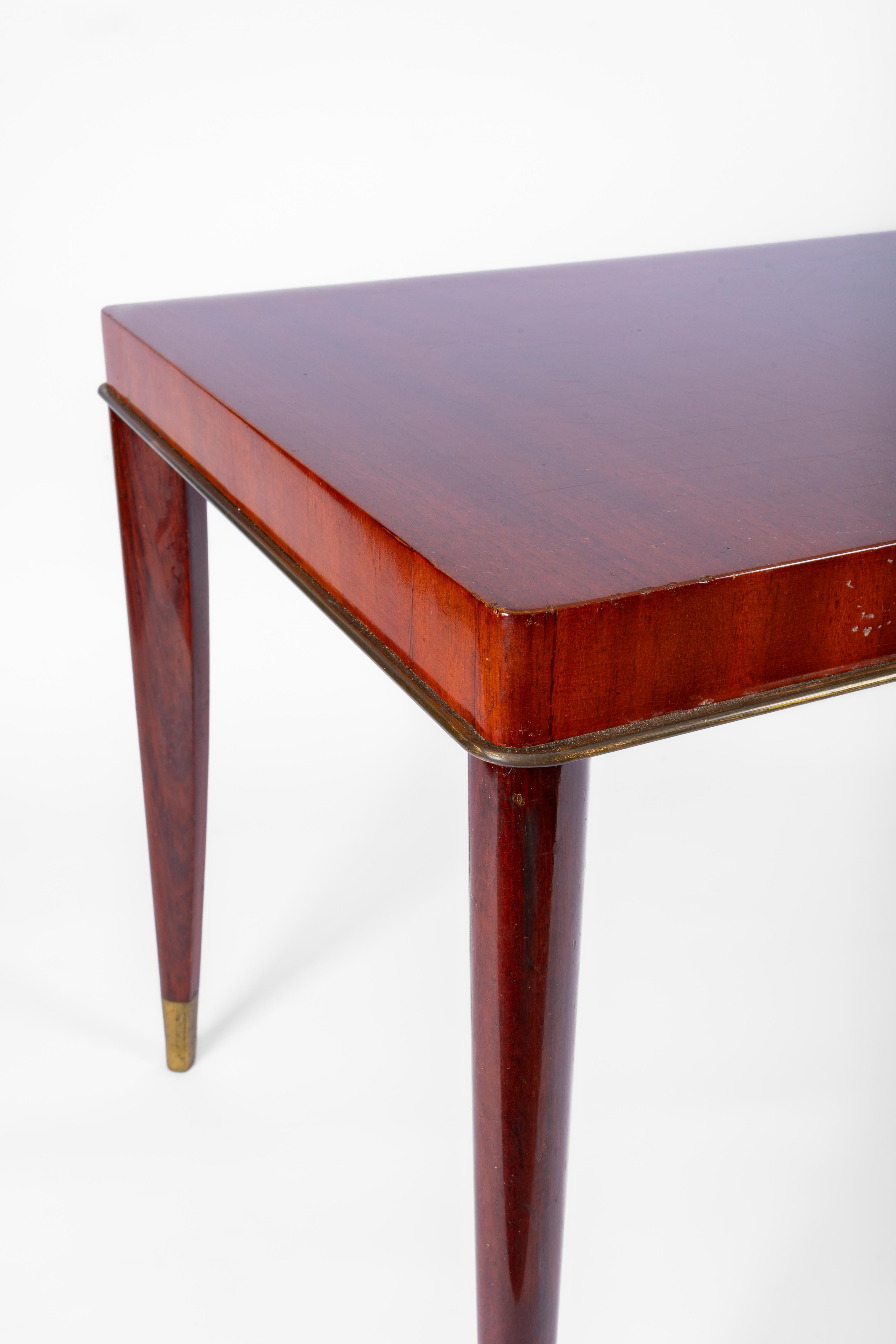 Splendid Coffee-table by De Coene frères Kortrijk.

Model: Voltaire

Period: +/- 1950

This table in the Voltaire-series was created by Paul Vandenbulcke.

The most elegant series that ever was created by De Coene.

Made in Iroko wood with a varnish