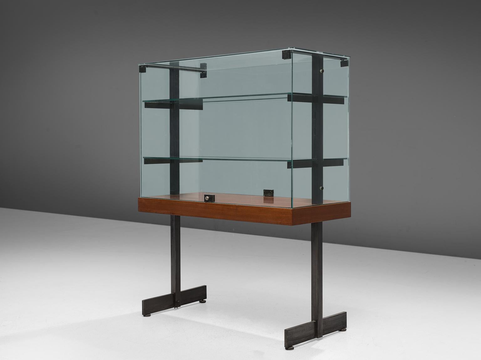 De Coene, vitrine, teak, steel and glass, Belgium, 1960s. 

Modernist showcases with two doors on the side all original glass and in good condition. Accompanied with steel and wood frames. The vitrine features the brutalist and muscular