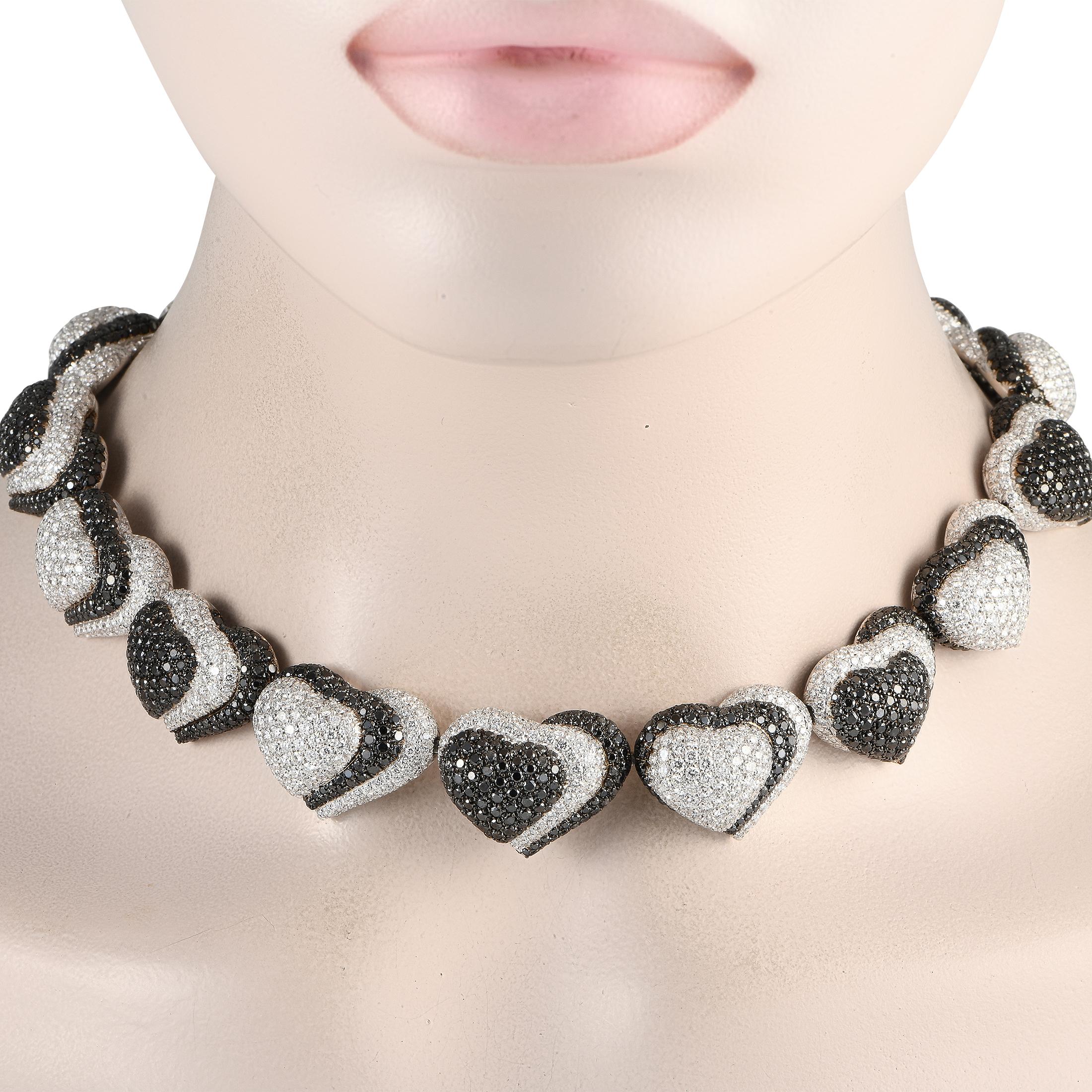 Here is a daring creation of Swiss luxury jeweler De Grisogono showcasing their expertise in using black diamonds. This statement-making necklace features a 15.5-inch-long line of domed hearts, each meticulously set with a combination of black and