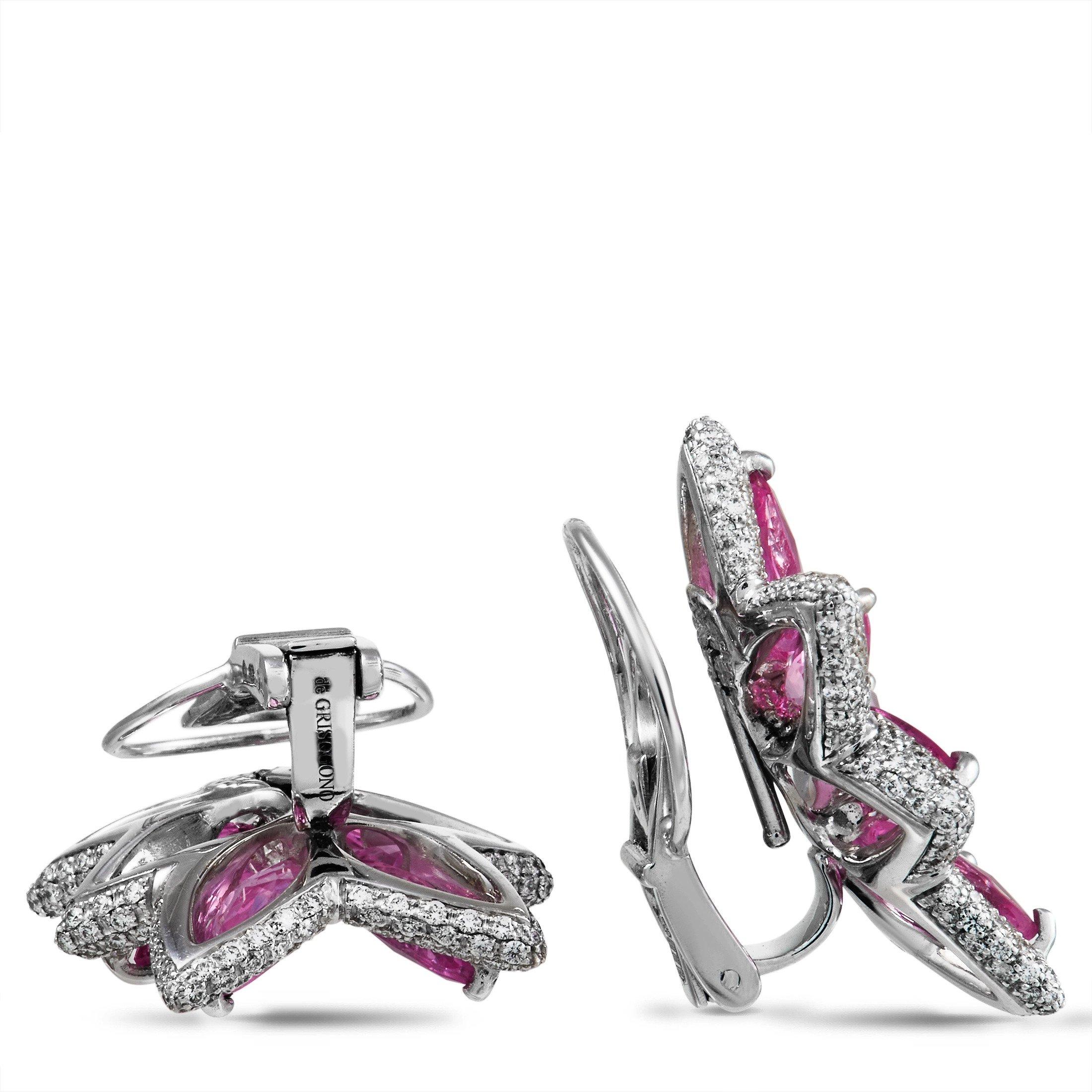Bold, vibrant, and dynamic in design, these De Grisogono earrings will forever make a statement. A breathtaking arrangement of pink sapphires totaling 15.20 carats add undeniable visual impact, especially when bordered by glittering diamonds