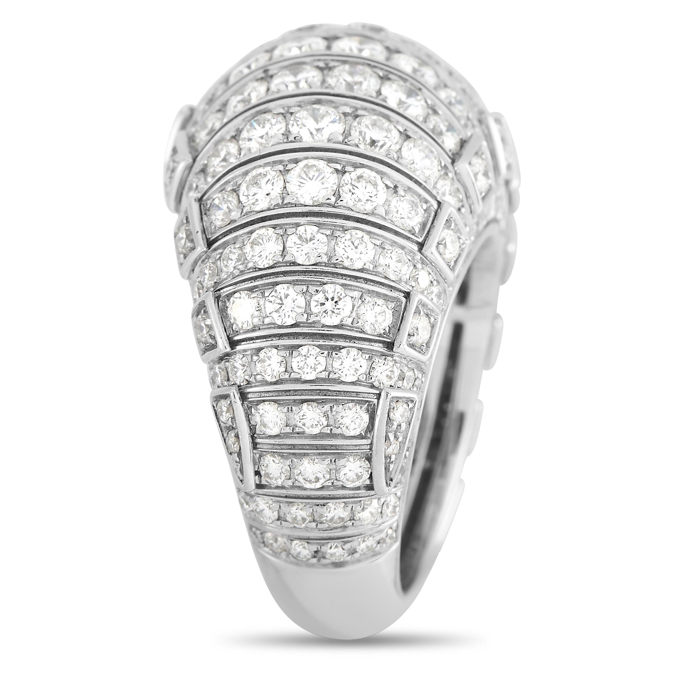Bold and eye-catching, this ring will forever make a statement. The rounded 18K White Gold setting features a 4mm wide band and a 10mm top height. It also comes to life thanks to a glittering arrangement of diamonds with a total weight of 7.30