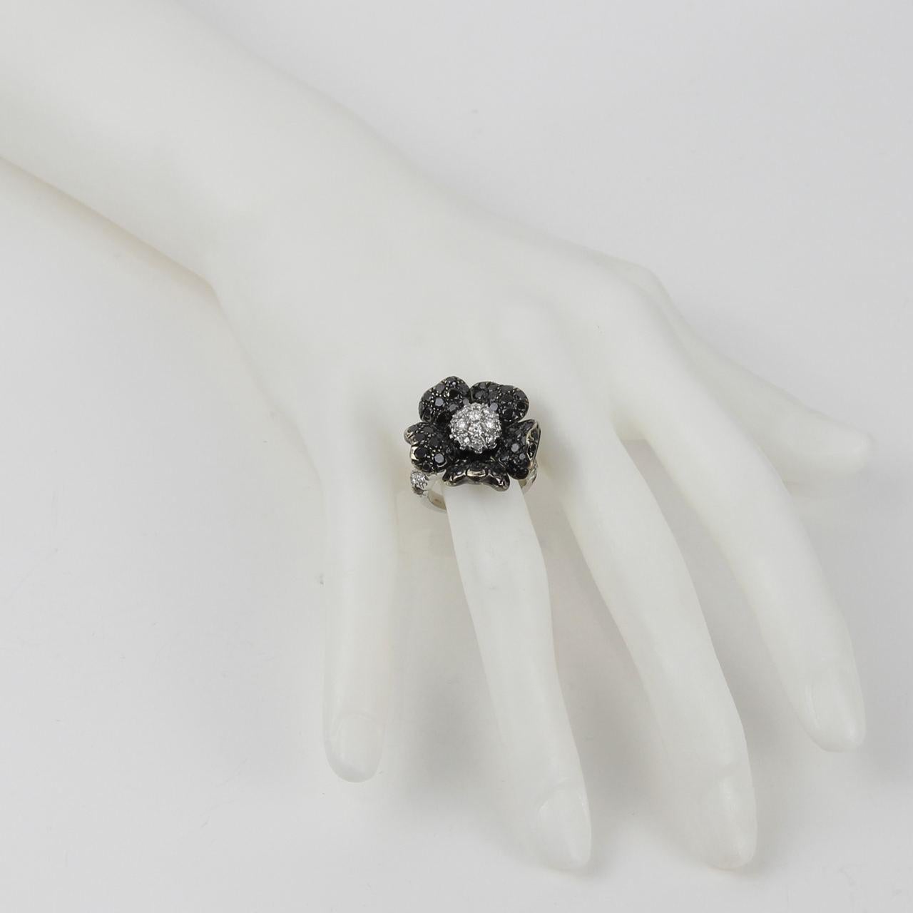 Diamonds: 1.75cts

Black Diamonds: 3.30cts

Ring Size: 6.0