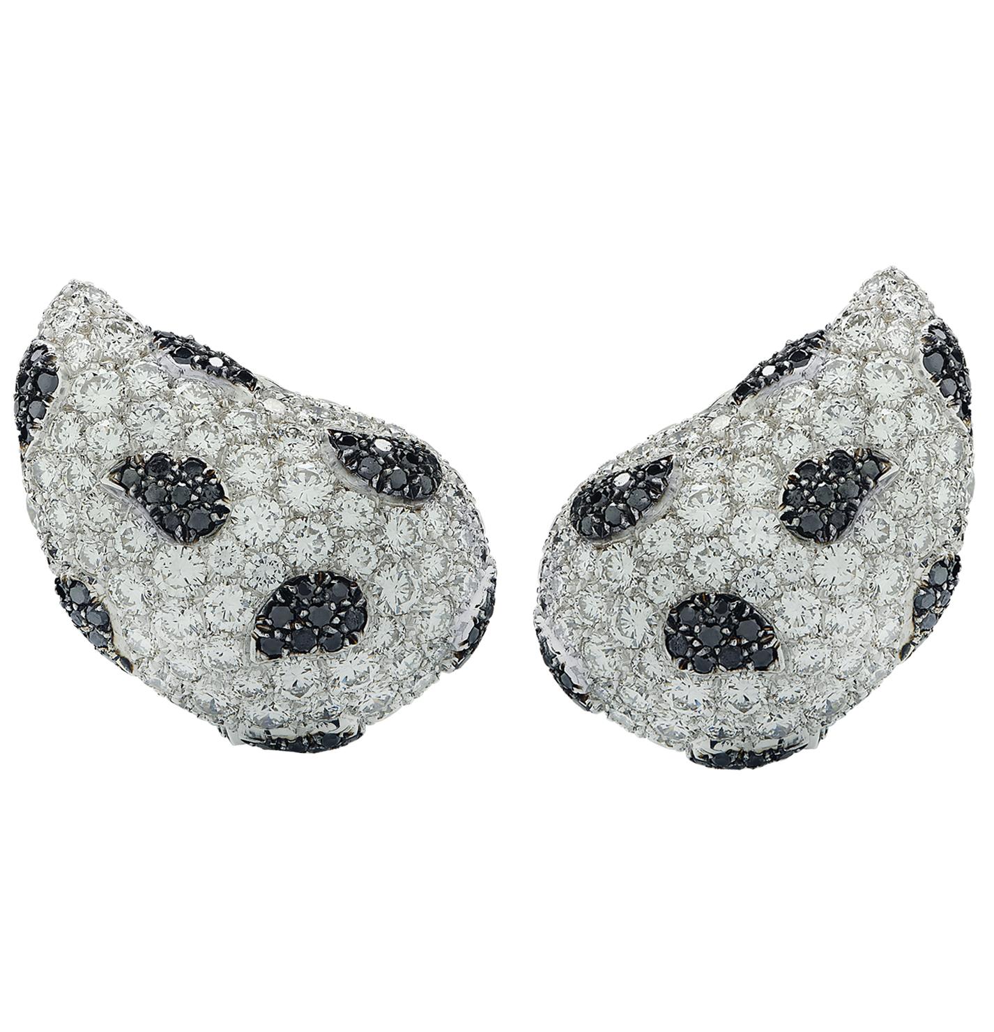 Stunning de Grisogono diamond stud earrings crafted in 18 karat white gold, featuring 204 round brilliant cut diamonds weighing approximately 3.25 carats total, F-G color VS clarity, and 128 round brilliant cut black diamonds weighing approximately