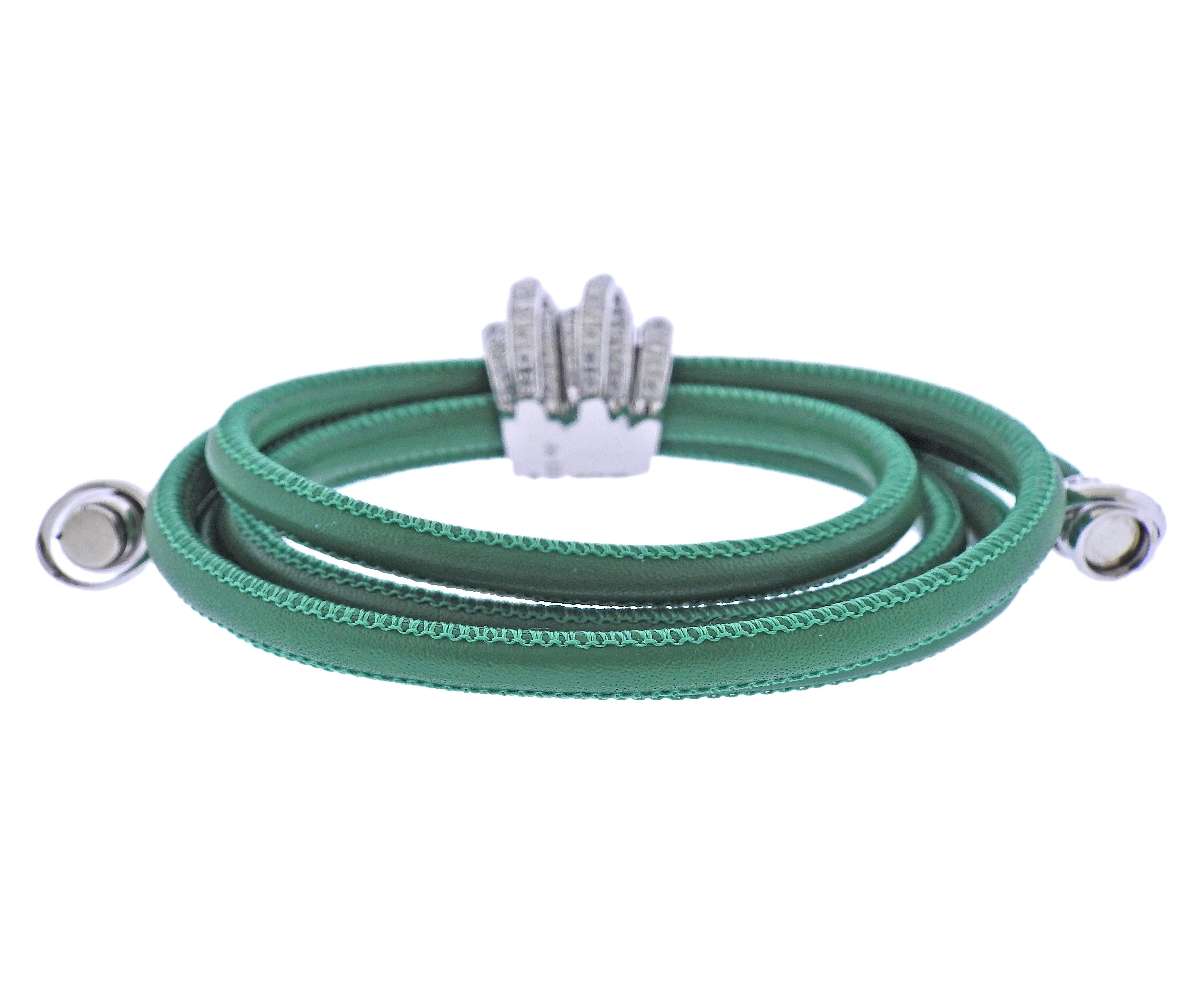 De Grisogono 18k gold and green leather bracelet, set with 3.60ctw VVS/FG diamonds. Comes with COA. New/store sample, with tag. Bracelet is adjustable, Gold center measures 25mm x 21mm, magnetic 18k gold ends/closures. Weight - 36.7 grams. Marked: