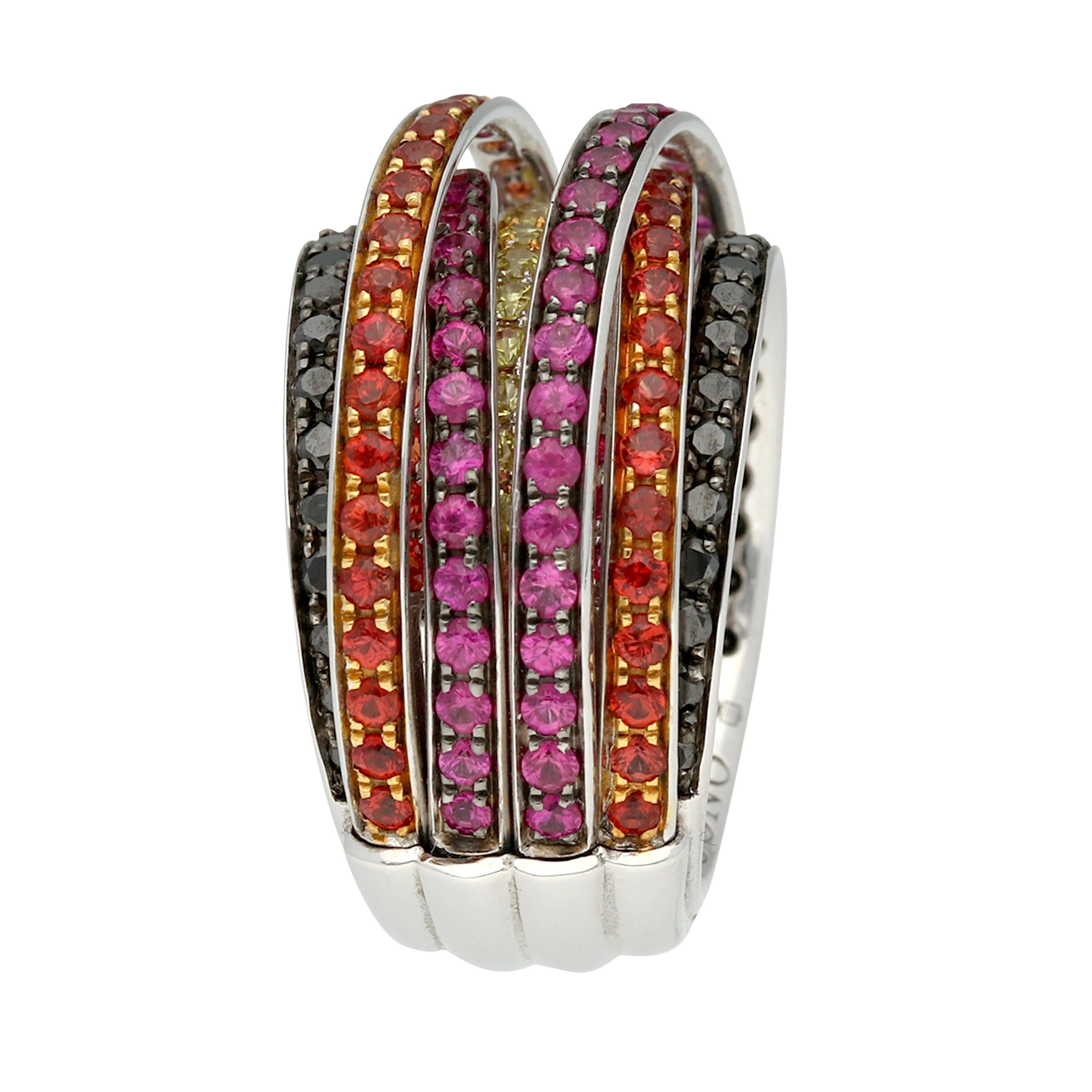 de GRISOGONO 'ALLEGRA' Gold Multi-Gem Diamonds Sapphires Cocktail Ring

Colorful de GRISOGONO ring in white gold, set with black diamonds, pink, yellow and orange sapphires. This piece looks like numerous bands stacked together in an eternal