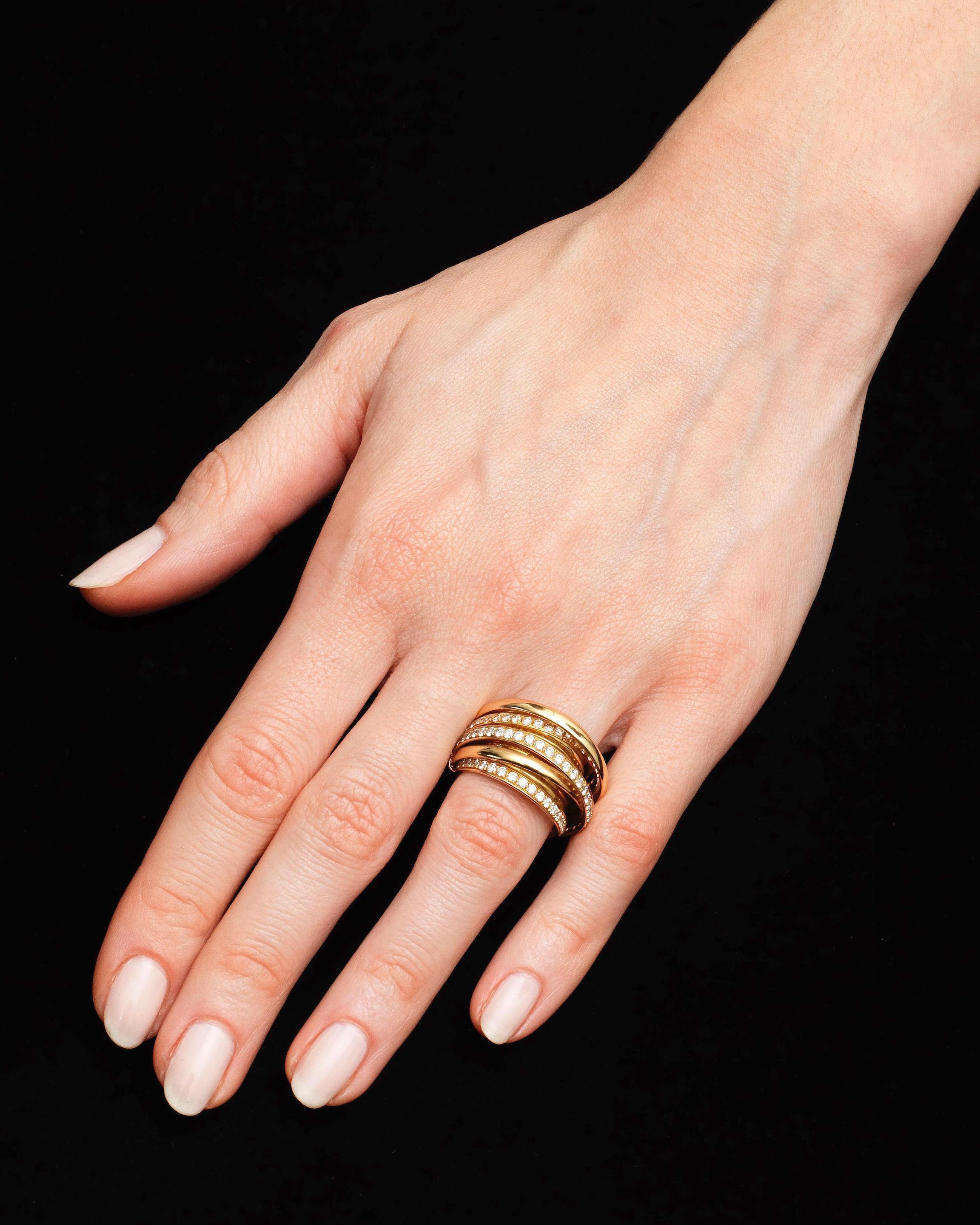 Magnificent DE GRISOGONO Allegra ring in 18k pink gold semi-paved with diamonds. 
Rare and highly sought-after model.
Original price: €15,000.
Condition : excellent. 
Size : 56 (US equivalent 7.5)
Diamond weight : 2.05 g
Total weight : 26 g
Width :