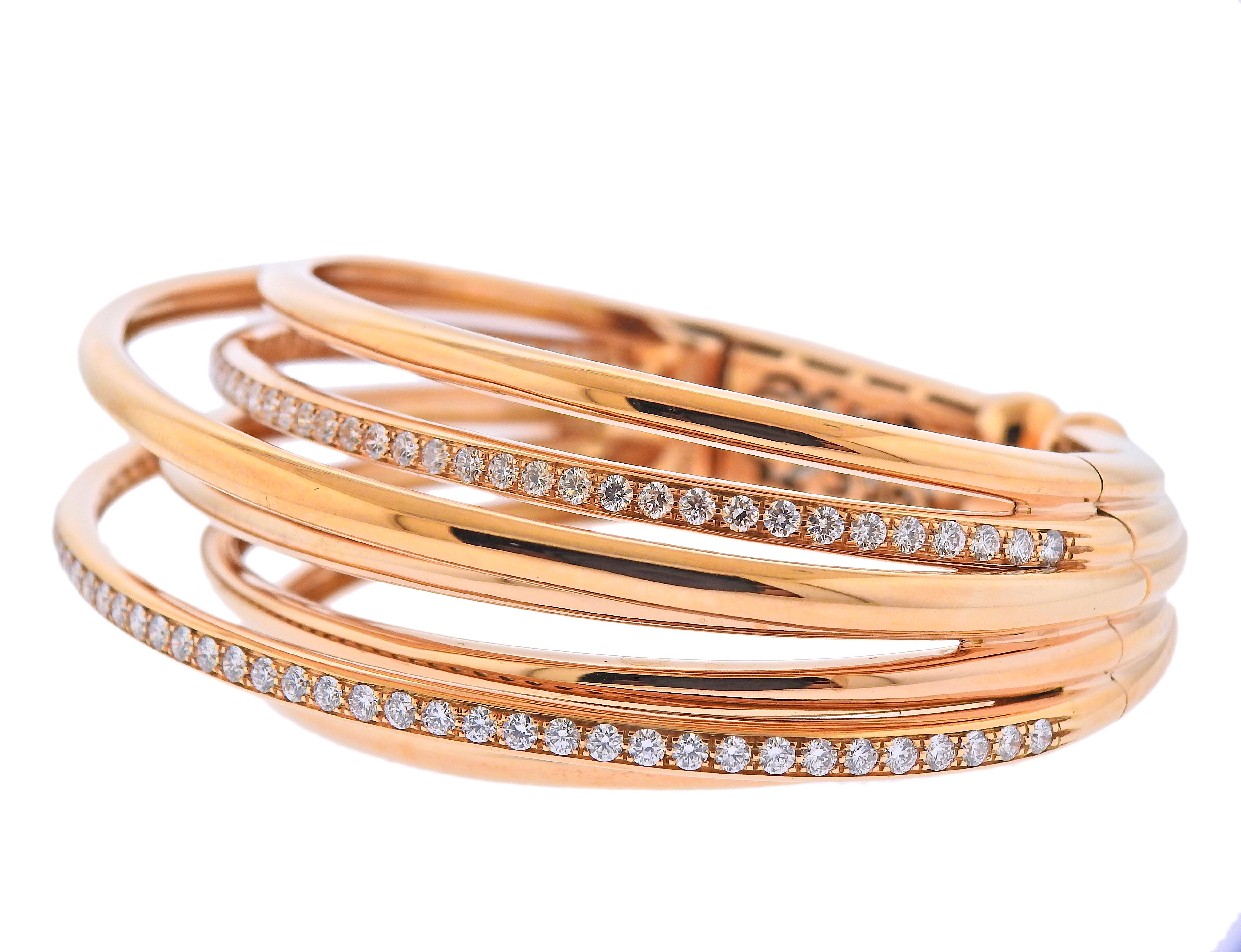 Brand new 18k rose gold bracelet by De Grisogono. Set with 3.95ctw in VVS F/G diamonds. Will comfortably fit up to 7 1/2