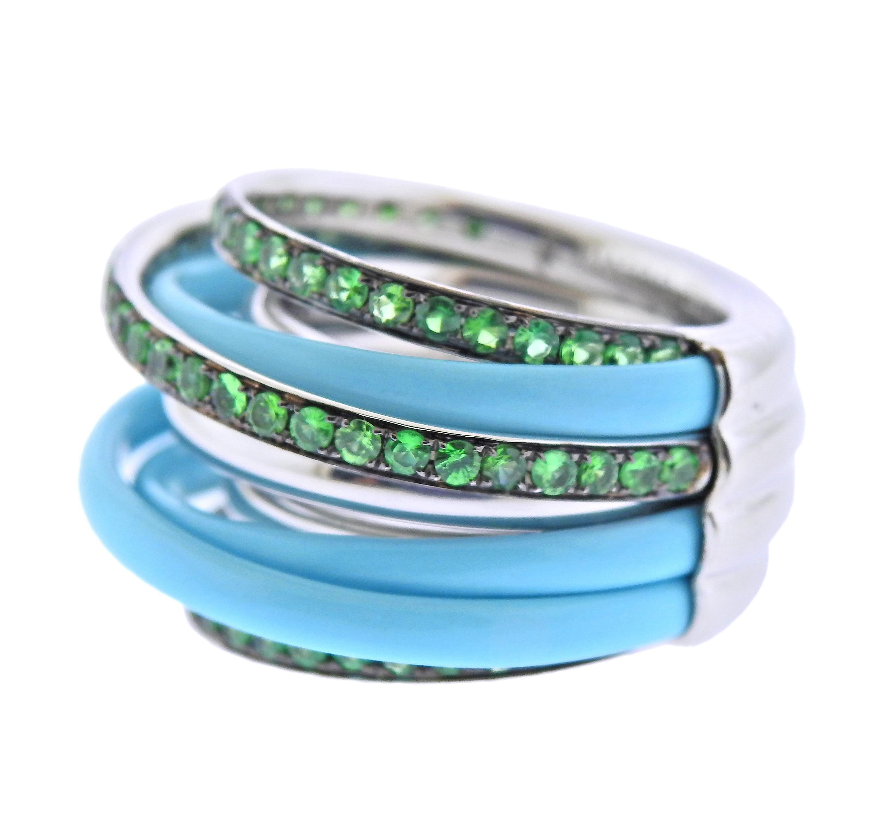 Brand new 18k white gold ring by De Grisogono. Set with 0.90ctw in Tsavorite. Ring size - 6.25 (53) , ring top - 17mm wide. Marked - de Grisogono, Au750, serial number. Weight - 25.6. Ring comes with COA, booklet and box. Retail $11020
