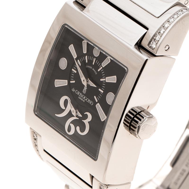 This Tino Acier wristwatch from De Grisogono is the perfect blend of grandeur and timeless appeal. Crafted from stainless steel, the watch features exquisite diamonds set on the lugs to create a chic finish. Its square dial, protected by a