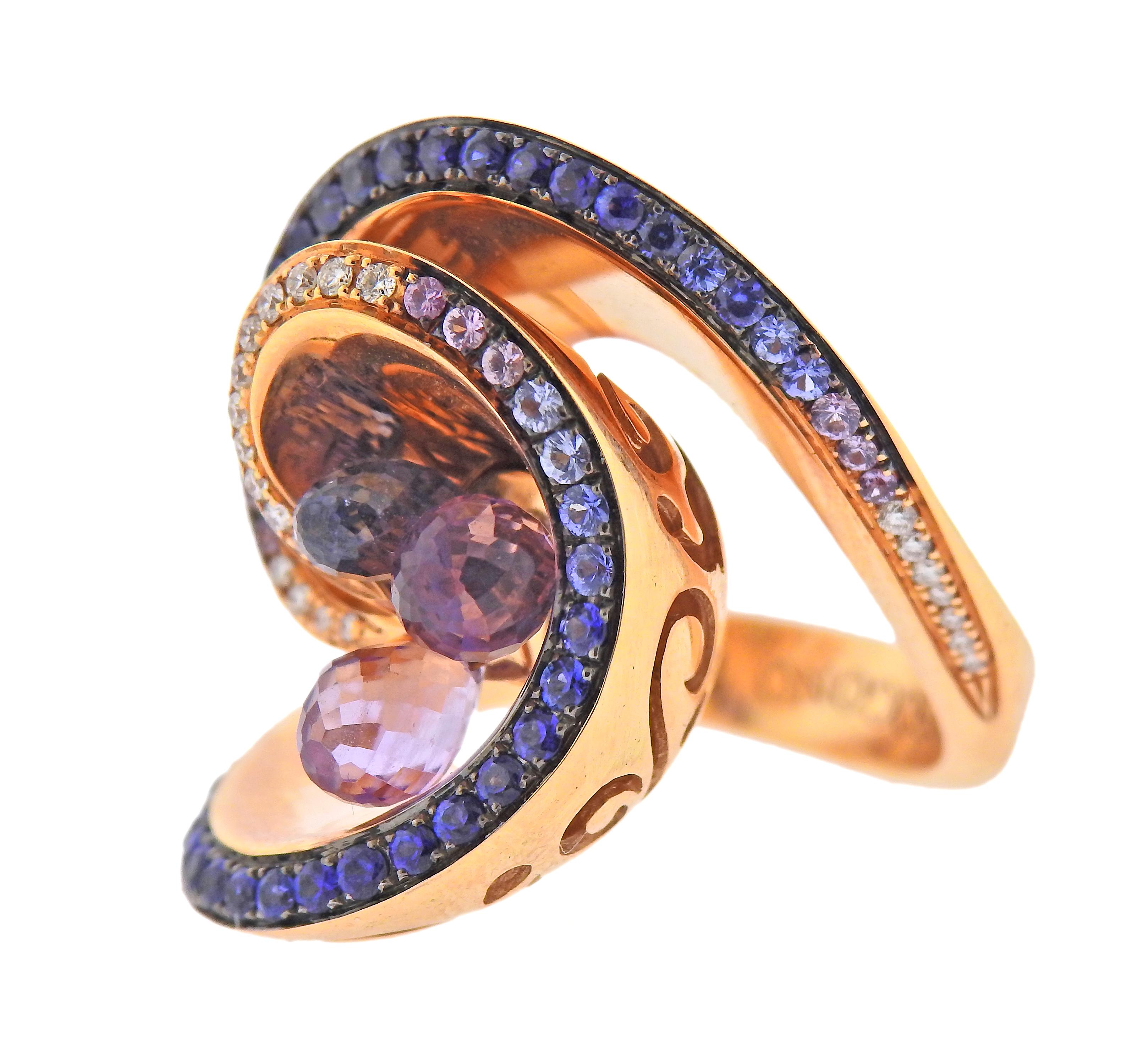 Brand new 18k rose gold multicolor gemstone Ring by De Grisogono. Set with 1.00ctw Amethyst briolettes, 0.50ctw Sapphire briolettes, 0.82ctw Sapphire, 0.16ctw of VS/G Diamonds. Ring size - 5.5 (50), ring top - 25mm wide. Marked - de Grisogono,