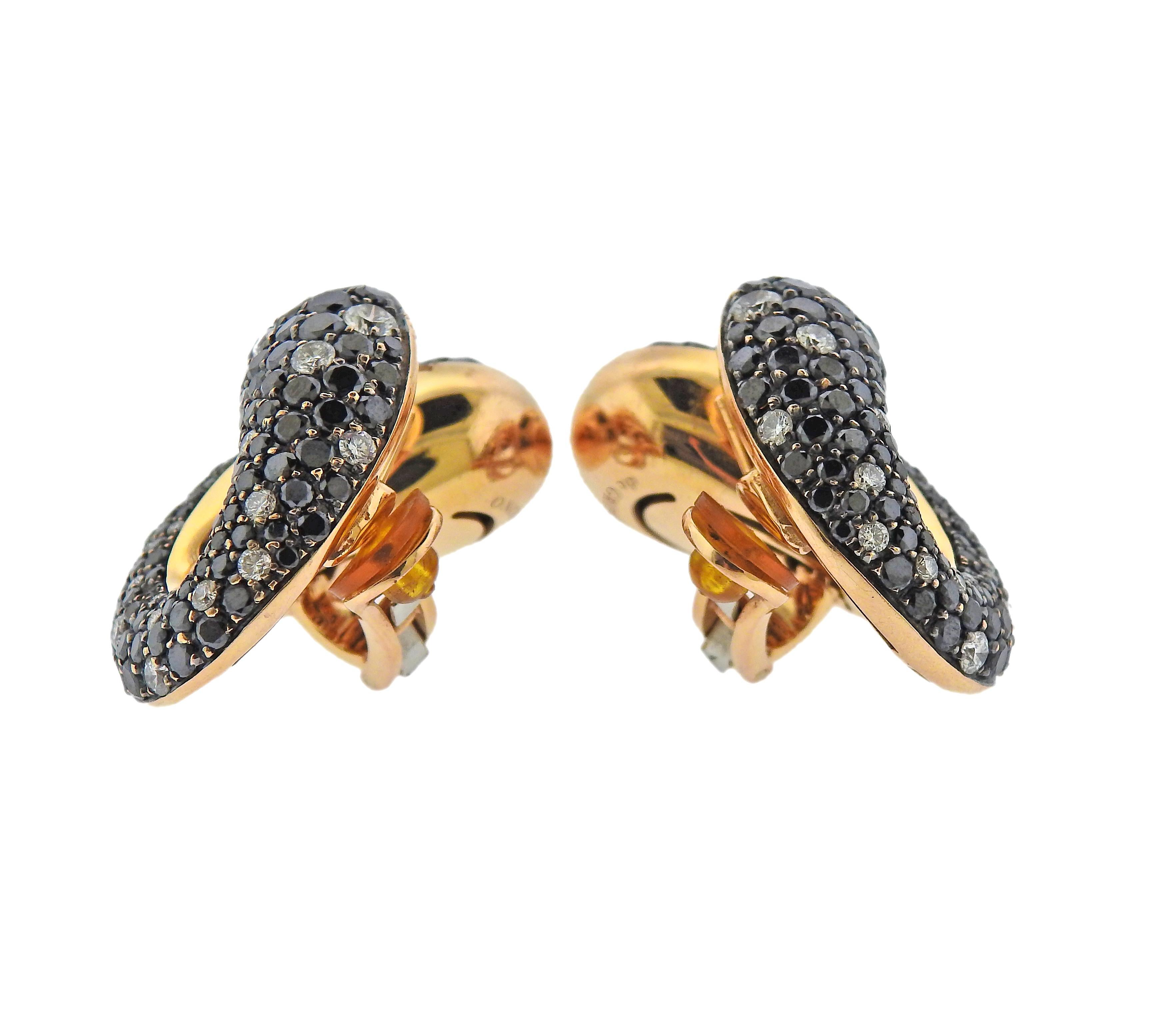 Pair of exquisite 18k rose gold Contrario earrings by de Grisogono, with 9.10ctw in black and 2.60ctw G/VVS diamonds. Come with COA and box. Earrings are 35mm x 25mm. Weight - 36.3 grams. Marked: B 15066, de Grisogono, 750.